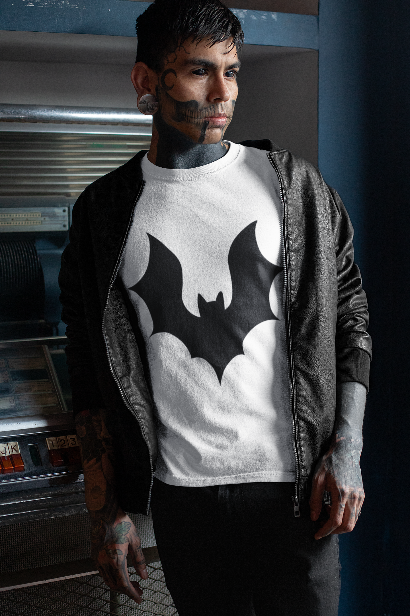 mockup-of-a-goth-man-with-a-tattooed-face-wearing-a-t-shirt-in-a-leather-bomber-jacket-26605.png