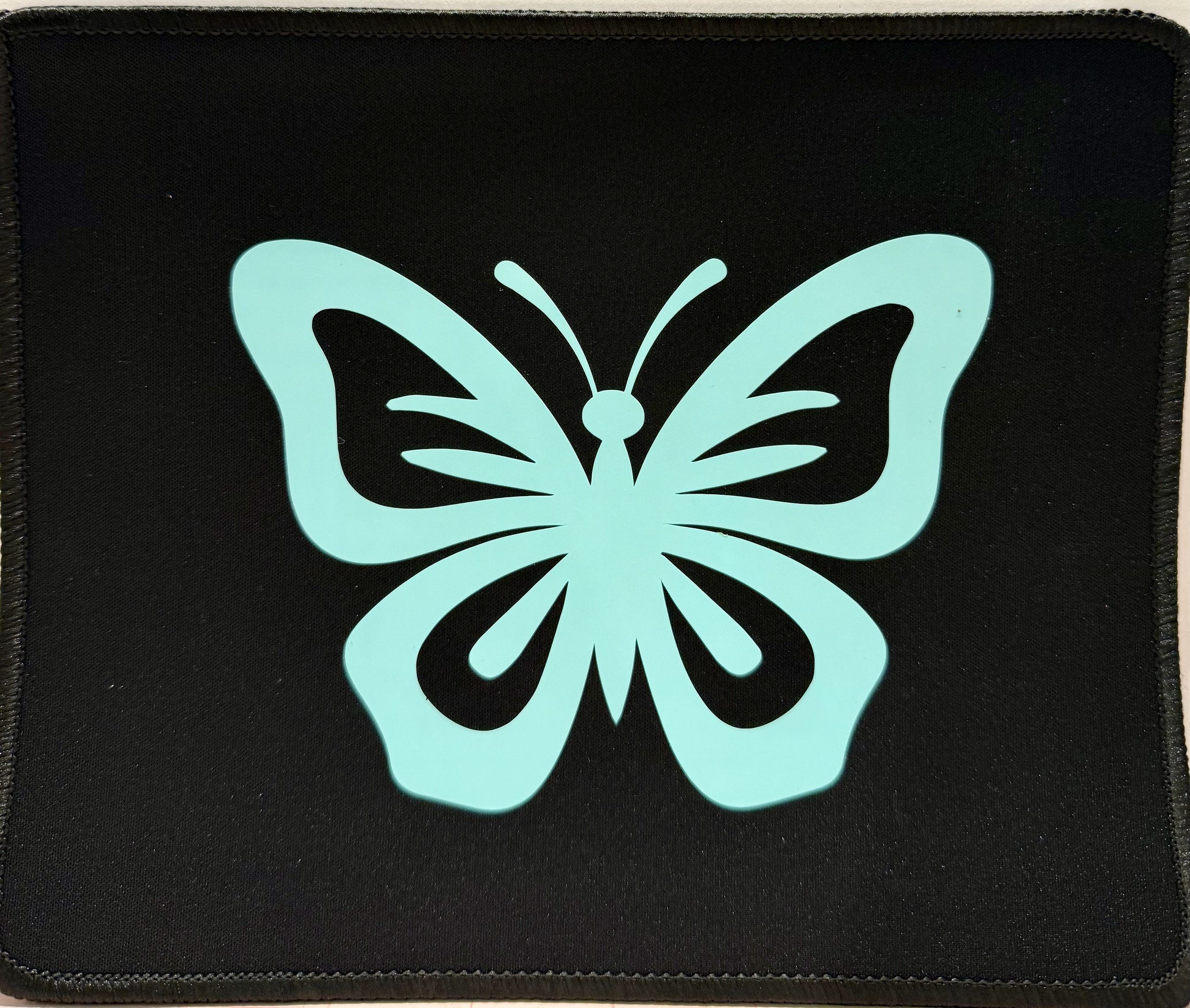 Butterfly Glow Mouse Pad