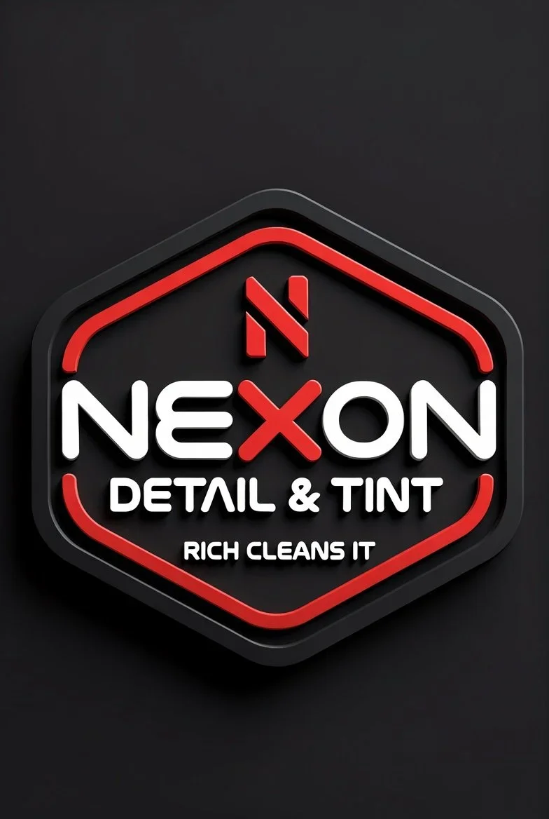 Neon sign for 'Nexon Detail & Tint' with slogan 'Rich Cleans It' on a dark background.