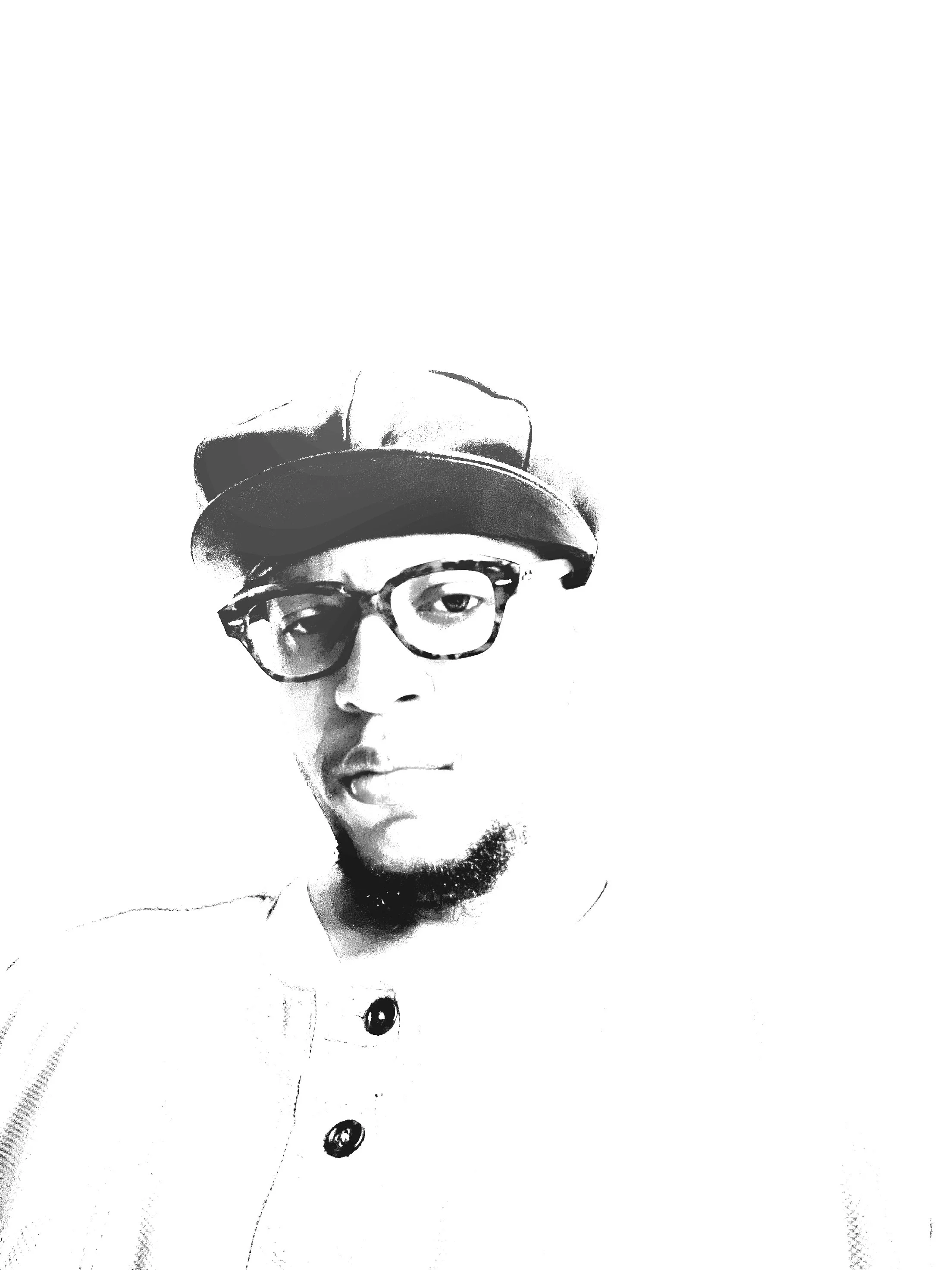 A black and white photo of a man wearing an old fashioned newsboy hat, thin frame tortoise styled Ray Ban glasses, and a long sleeve buttoned shirt.
