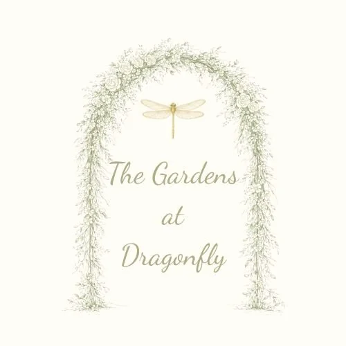 A logo with the text 'The Gardens at Dragonfly' surrounded by a decorative arch of greenery and a yellow dragonfly at the top.