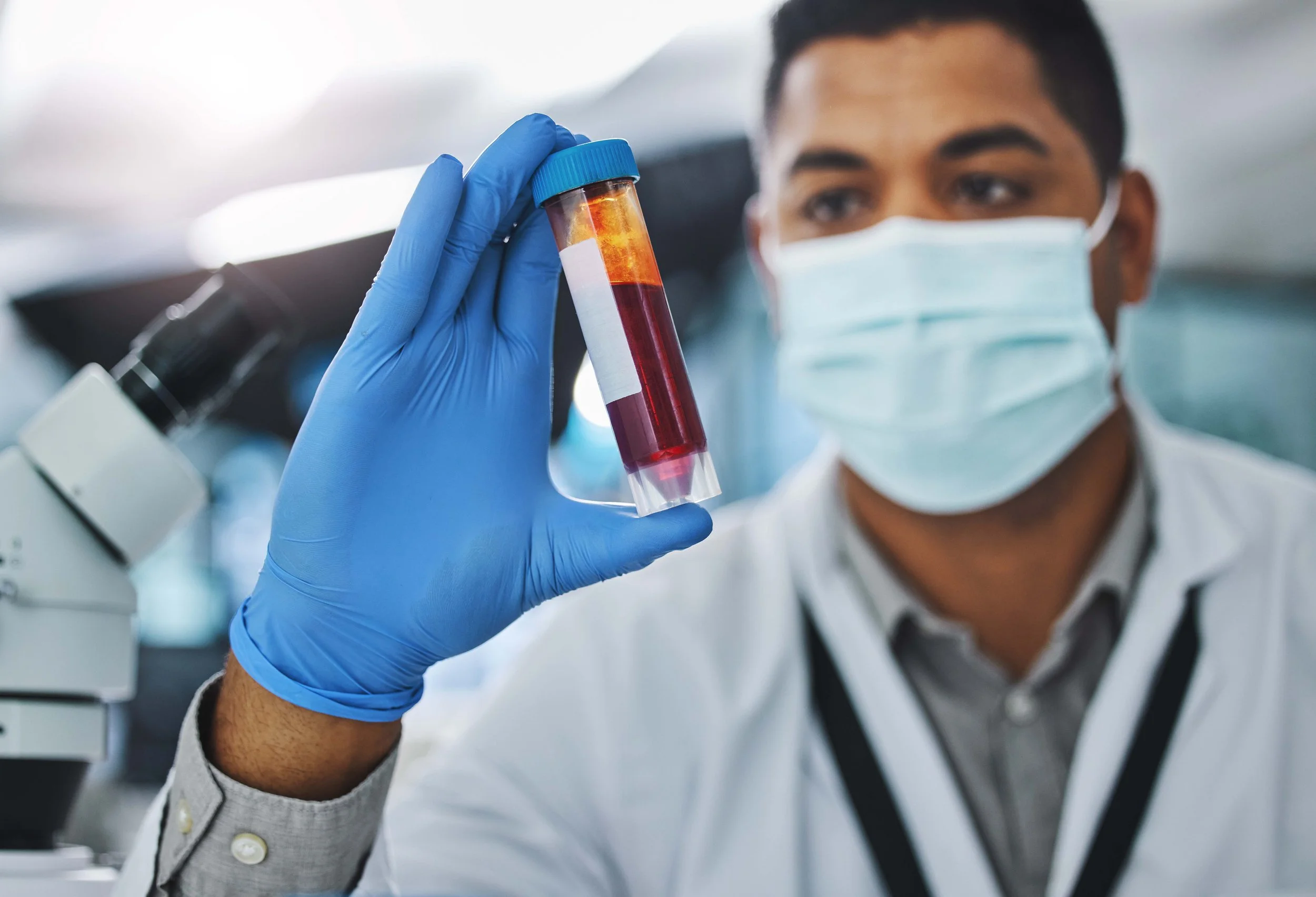 medical-researcher-holding-blood-sample-in-laborat-2026-01-09-10-20-25-utc.jpg