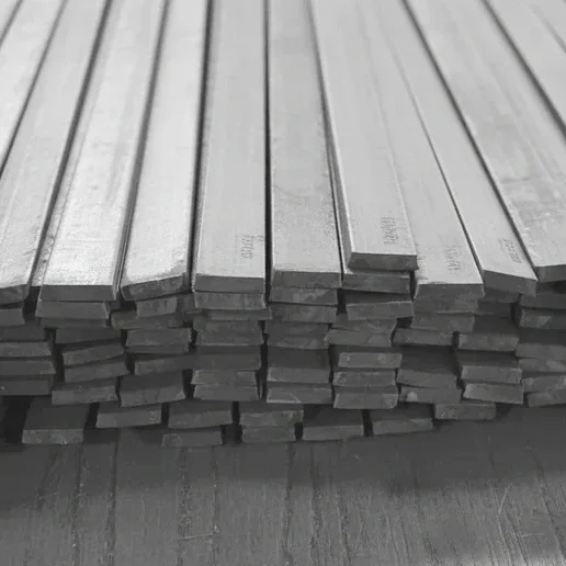 Pile_of_metal_flat_bar_strip_plate.webp