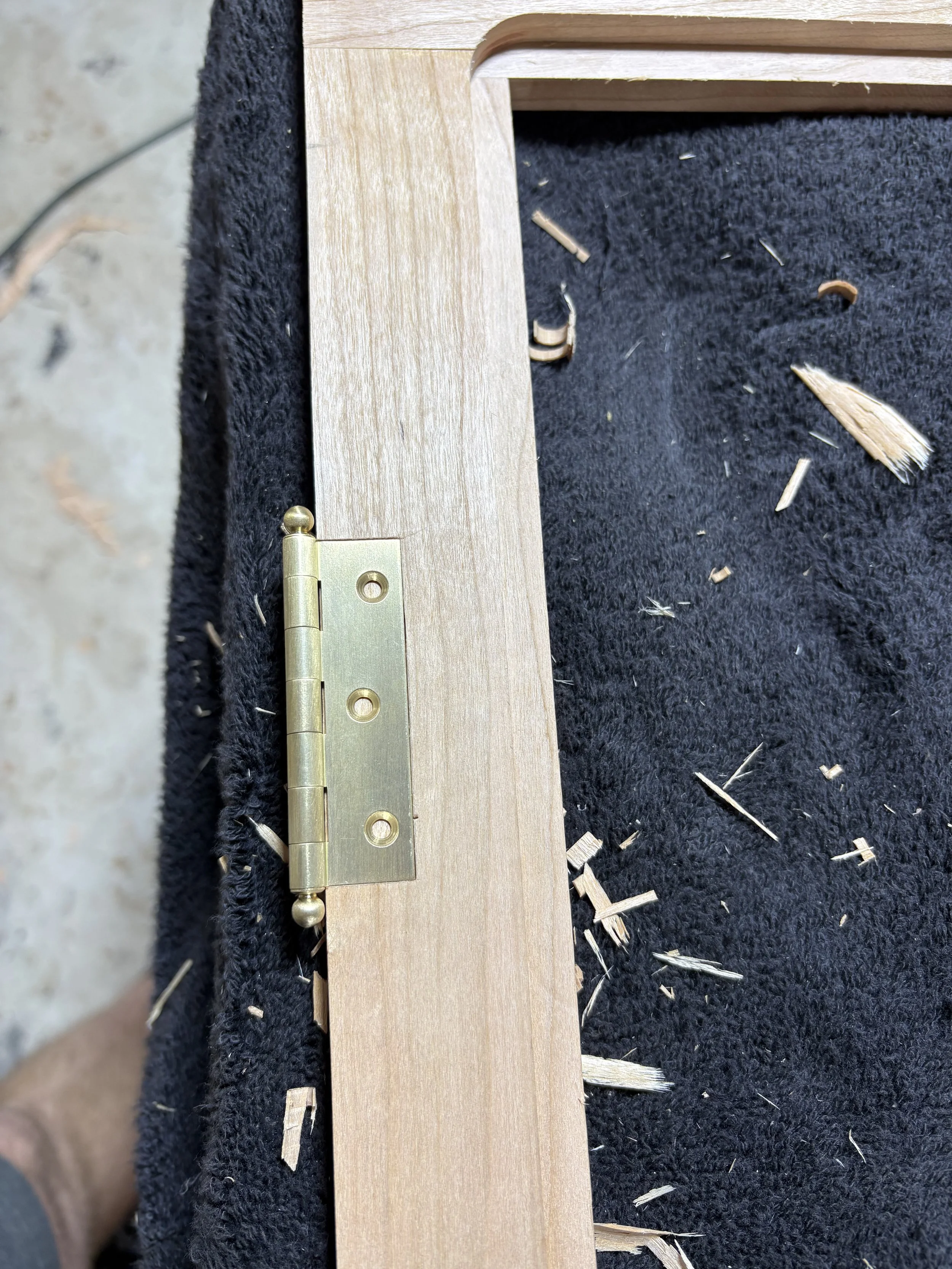 solid brass hinges hand cut into the door and case.
