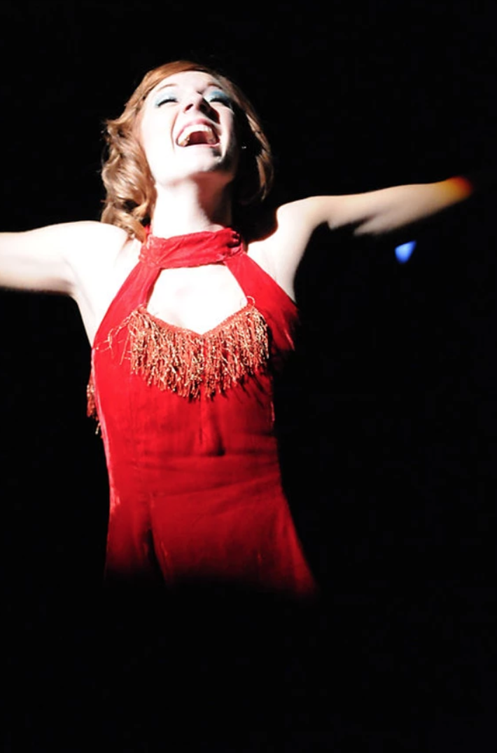 I have given very few standing ovations in eight years of Austin Theatre going, but after pitch-perfect Sara Burke turned to face the audience with one last infectious smile as the horn section offered one final blast. I couldn’t help but leap my fee