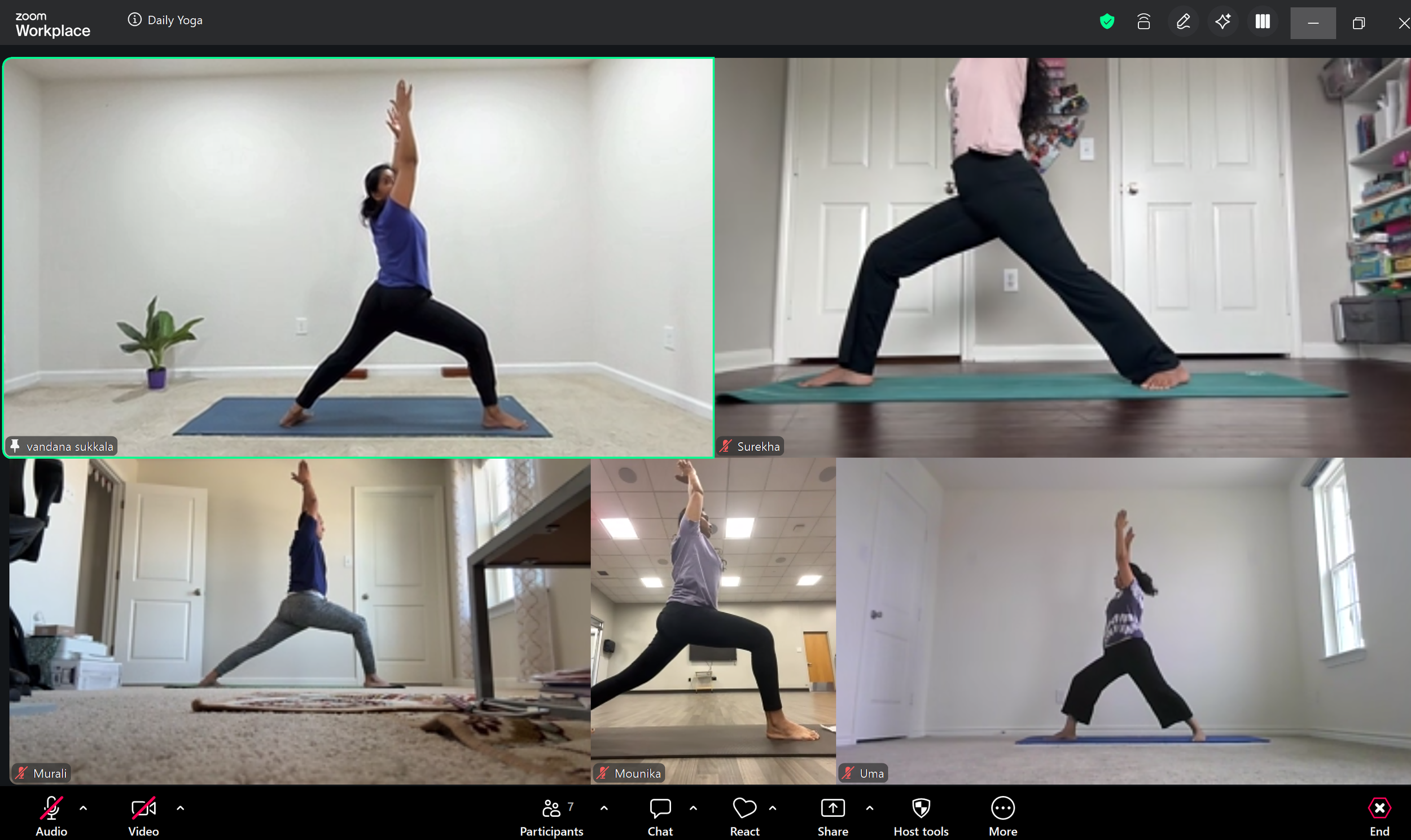 Slow N Steady yoga members practicing warrior pose