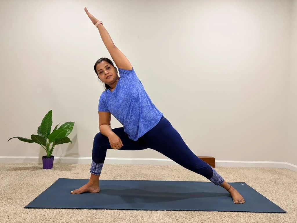 vandana guiding the class to do an asana slow and steady focusing on breath