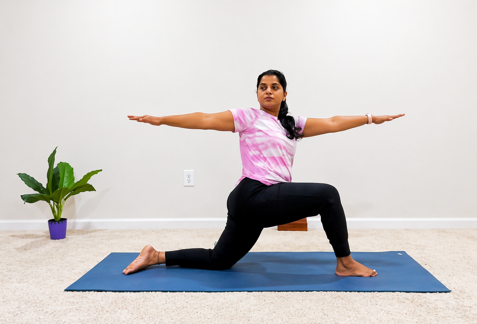 Vandana teaching warrior pose variation in online class at slow n steady yoga