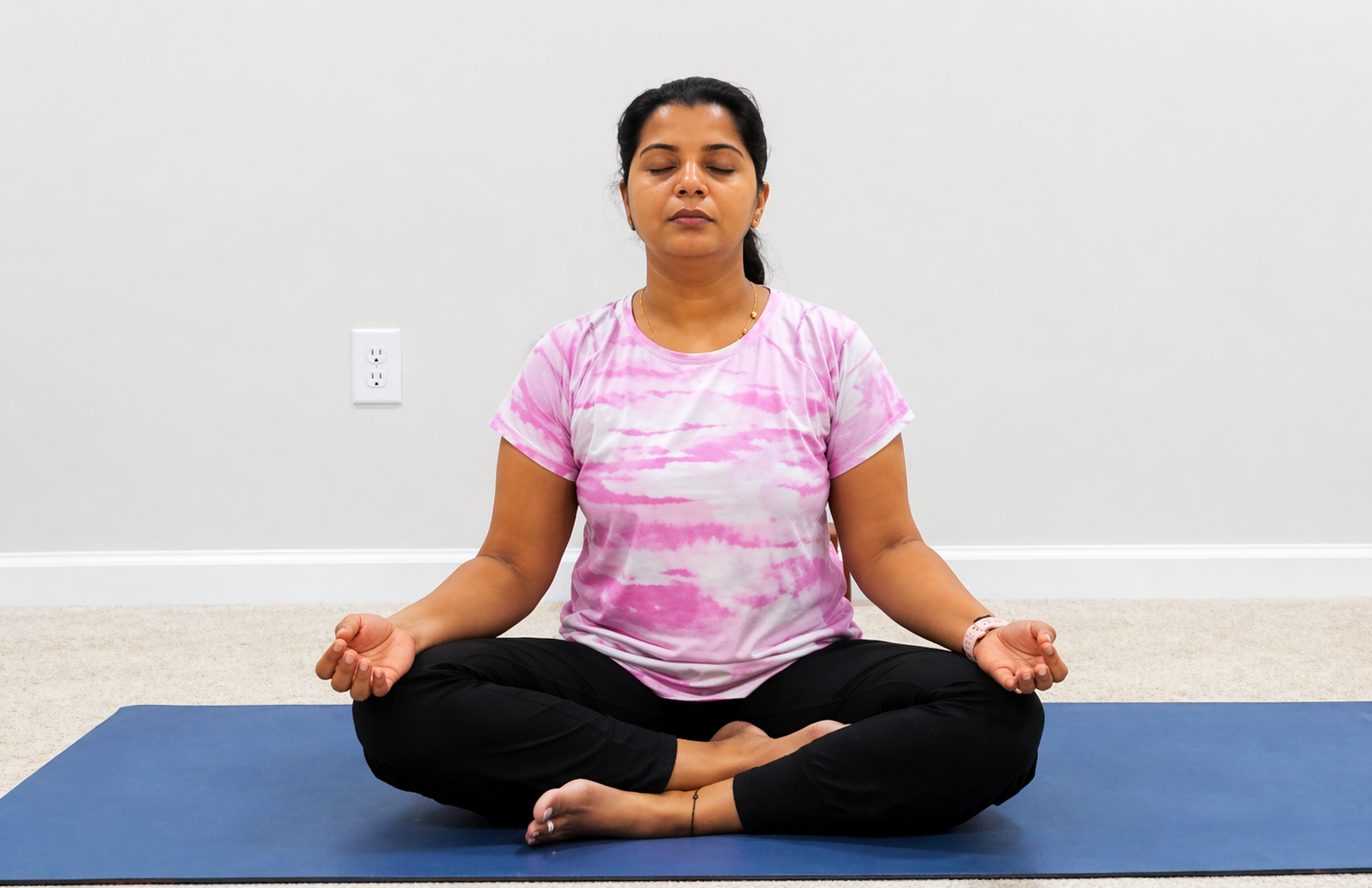 Vandana in a meditative pose in slow n steady yoga class
