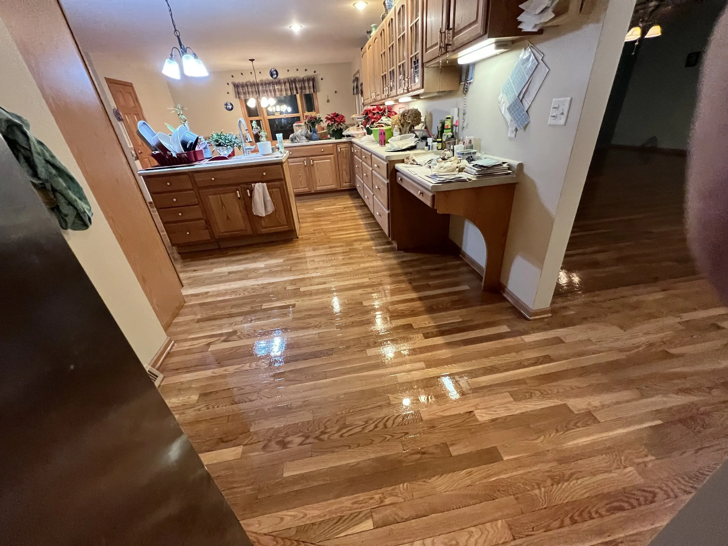 Restored hardwood flooring with a warm natural wood tone