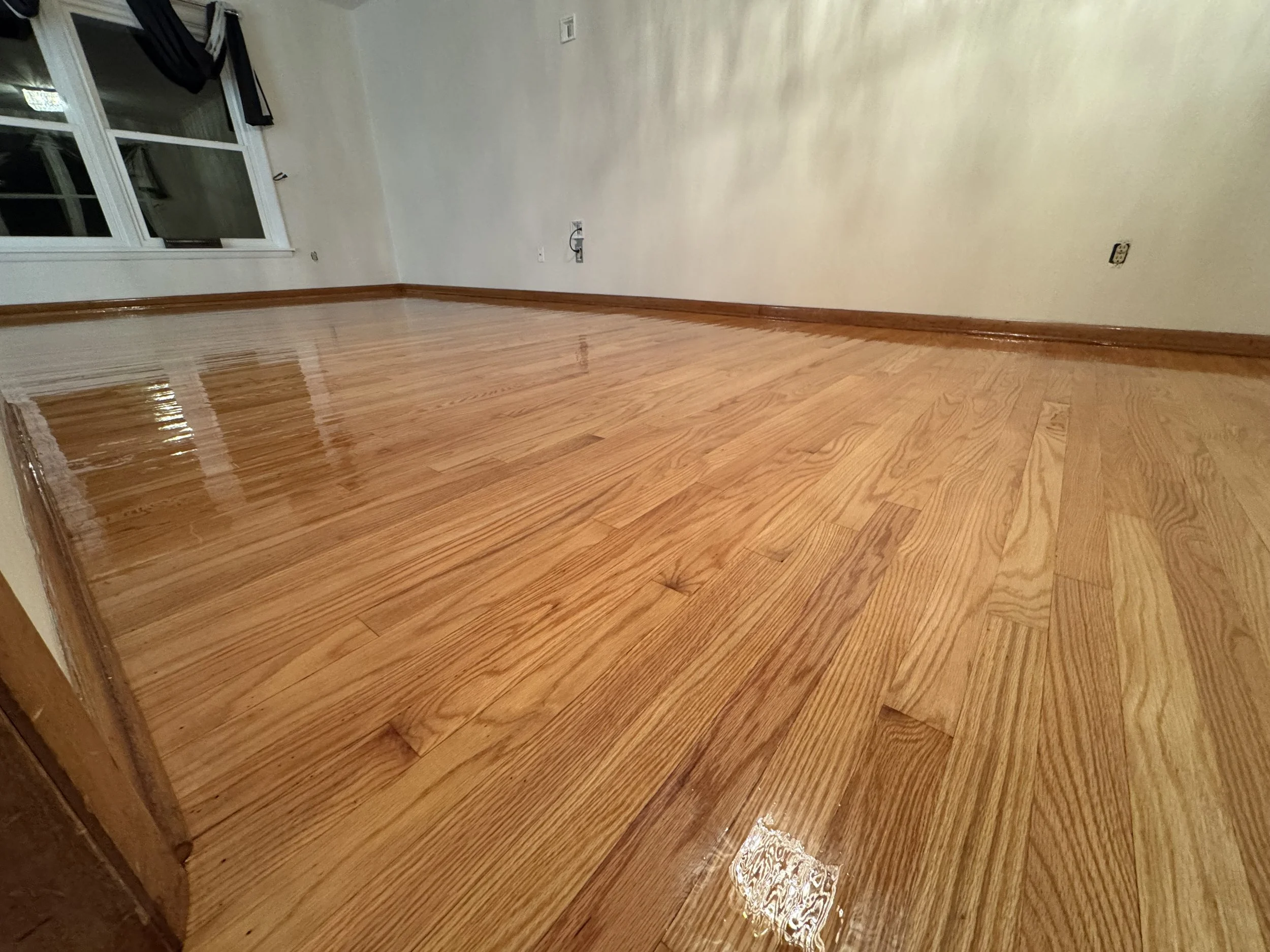 Professionally refinished hardwood floors in Durand, IL by Cristian Maxin Flooring