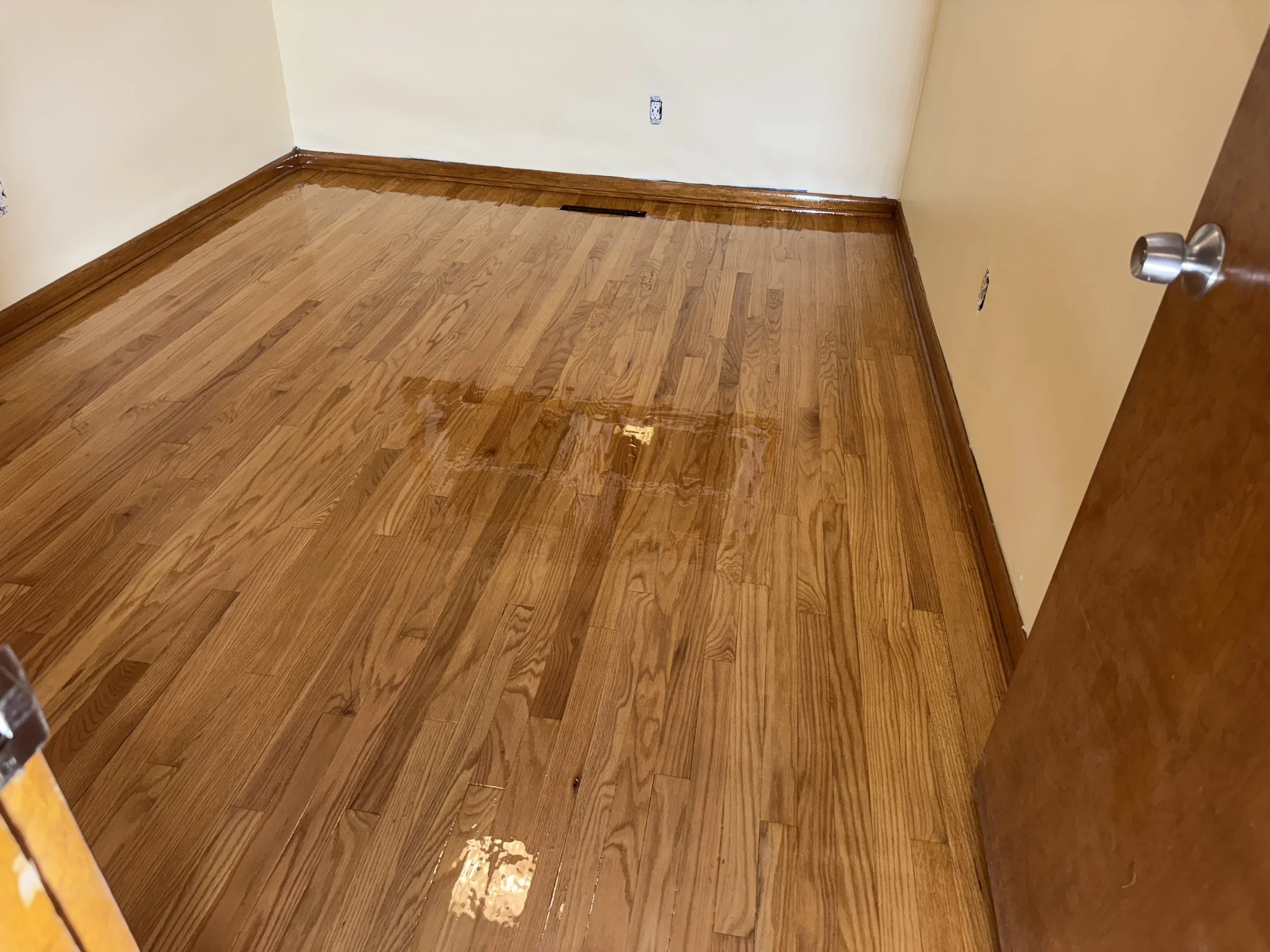 Professionally refinished hardwood floors in Caledonia, IL by Cristian Maxin Flooring
