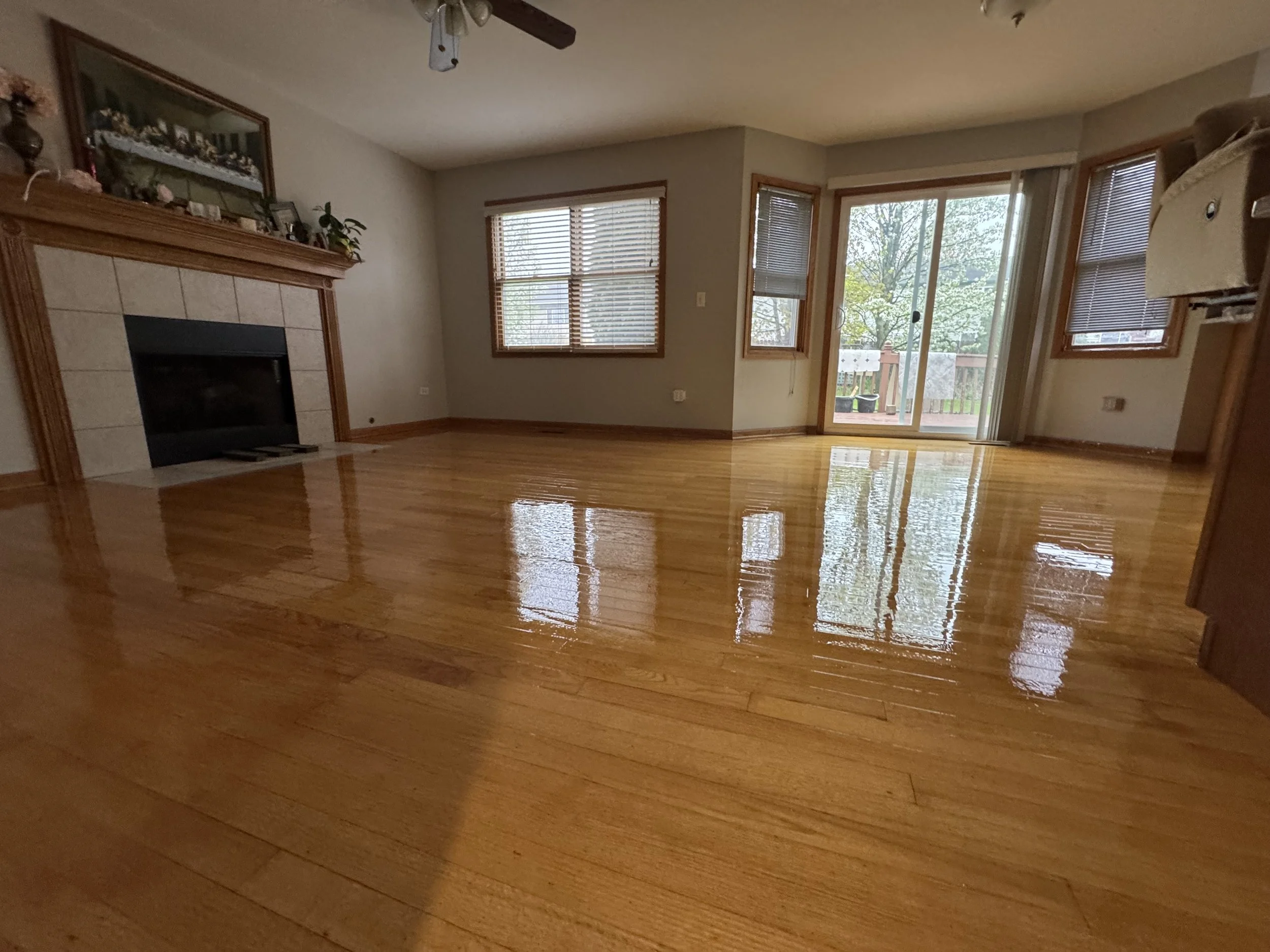Refinished hardwood floor with a smooth protective finish