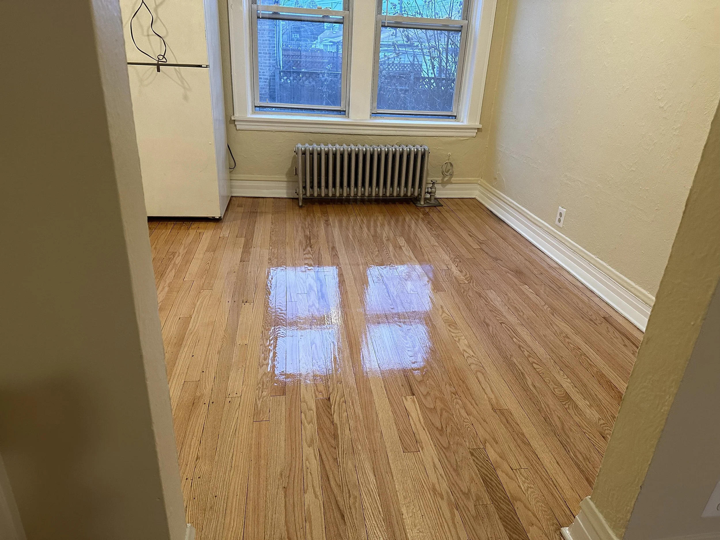 Professionally refinished hardwood floors in Capron, IL by Cristian Maxin Flooring