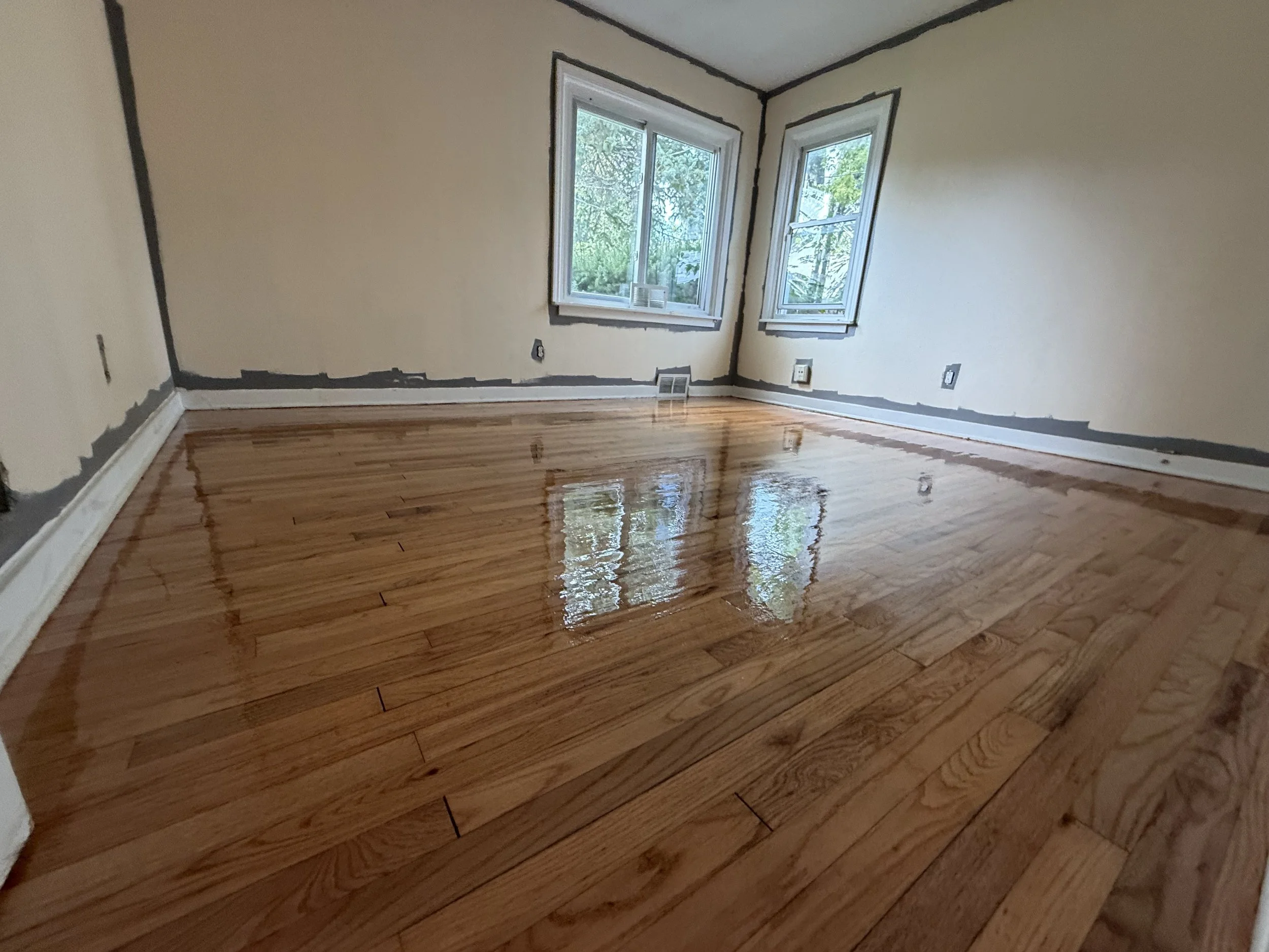 Refinished hardwood floor with a durable protective finish