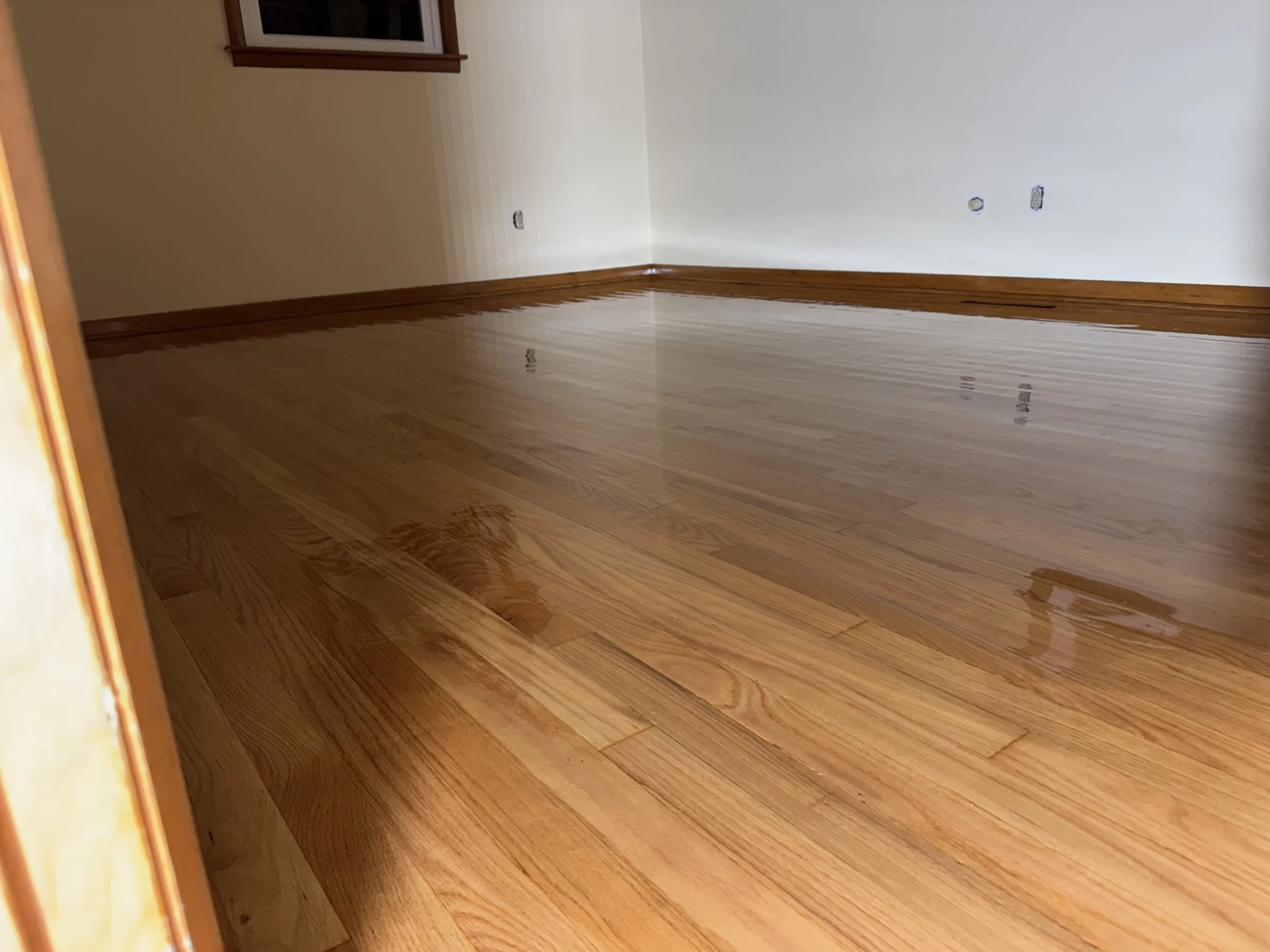 Professionally refinished hardwood floors in Winnebago, IL by Cristian Maxin Flooring