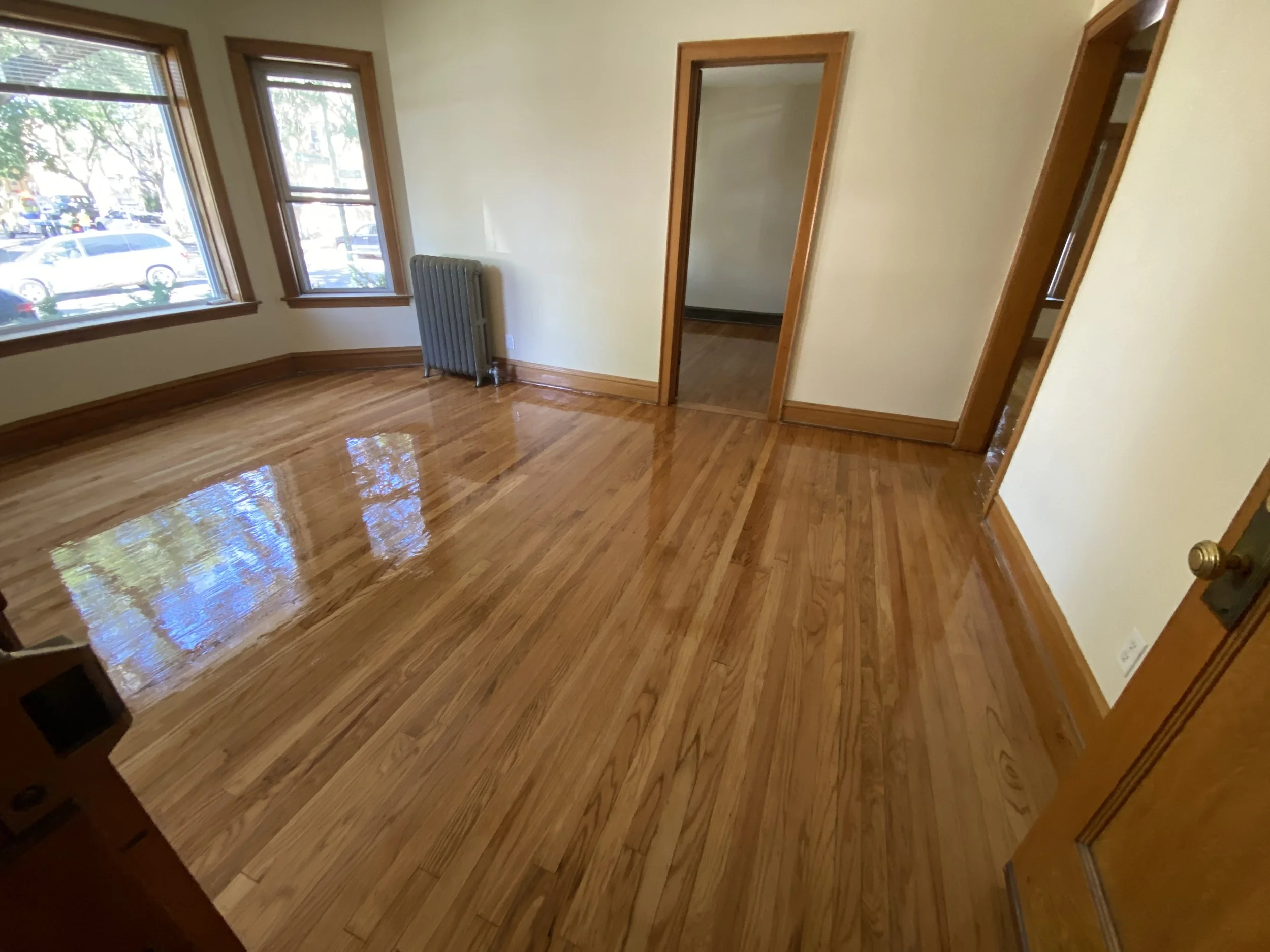Refinished hardwood flooring in Woodstock, IL by Cristian Maxin Flooring