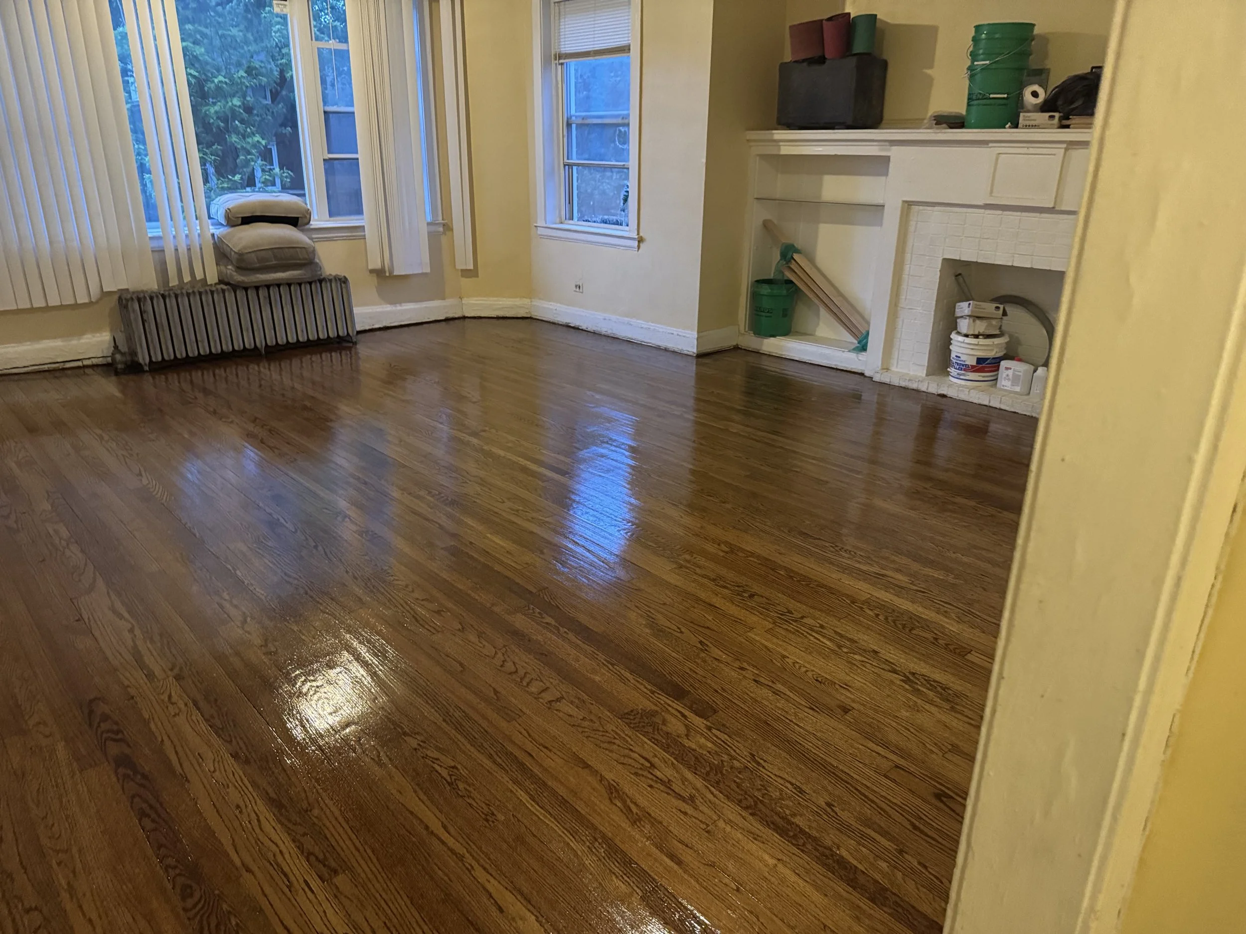 Refinished hardwood floor with renewed natural grain and durable protective finish in a Hazel Crest home