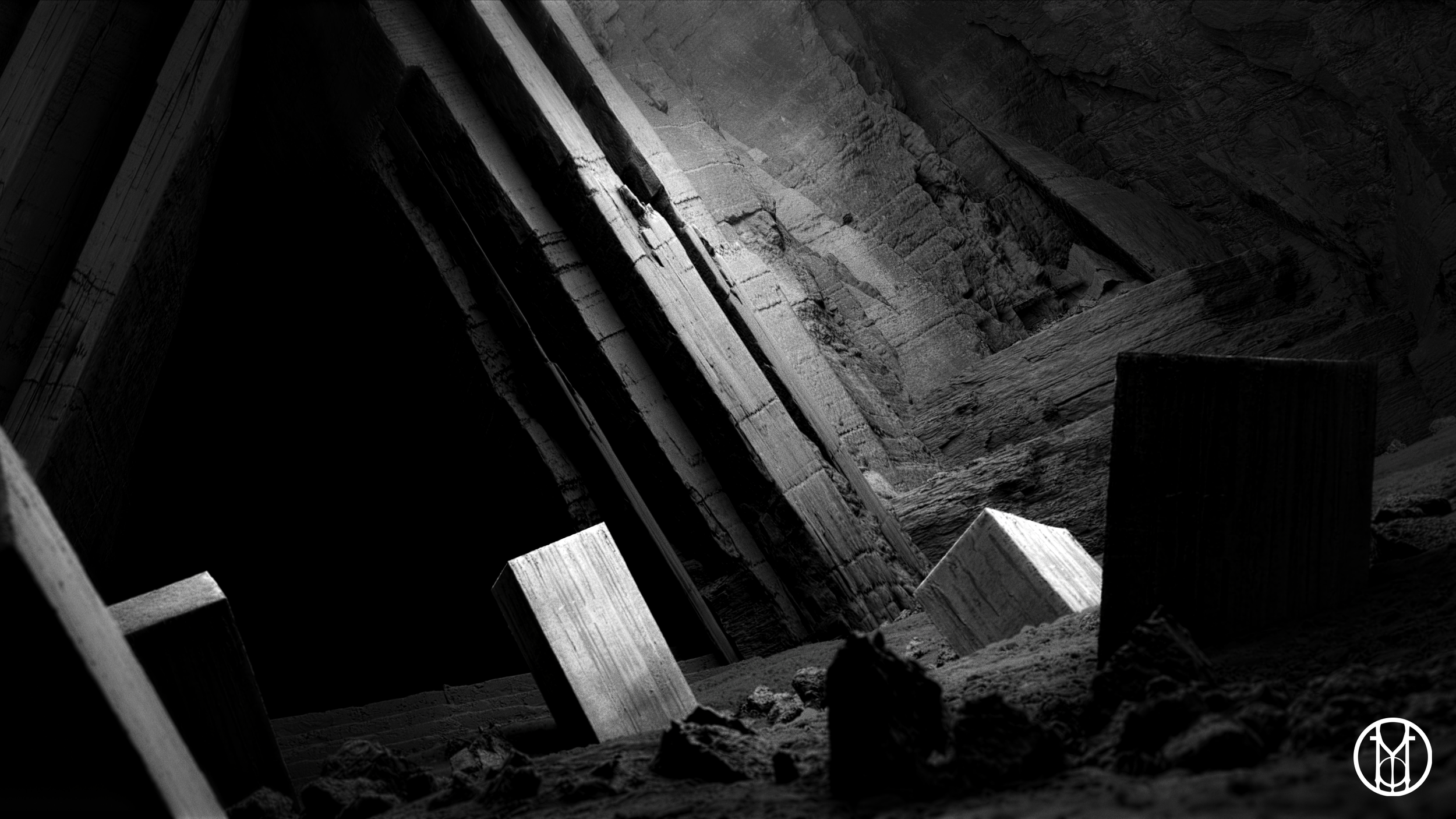 Black and white photo of large rectangular concrete blocks placed irregularly on a rough ground inside a cave or quarry with steep rocky walls.