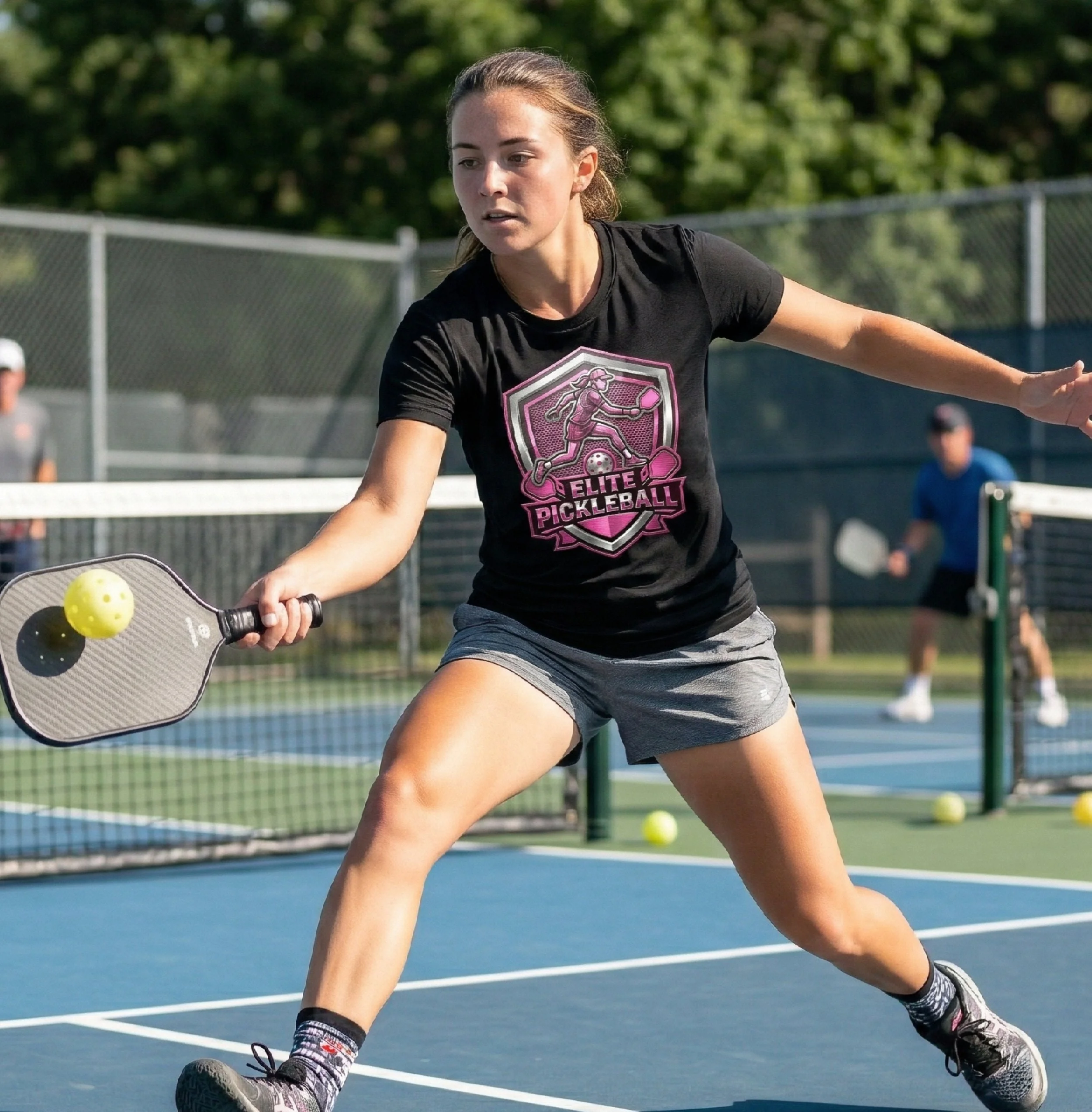A young woman playing pickleball on an outdoor court, dressed in sportswear, with a pickleball paddle and a ball visible. She appears to be in motion, reaching for the ball.
