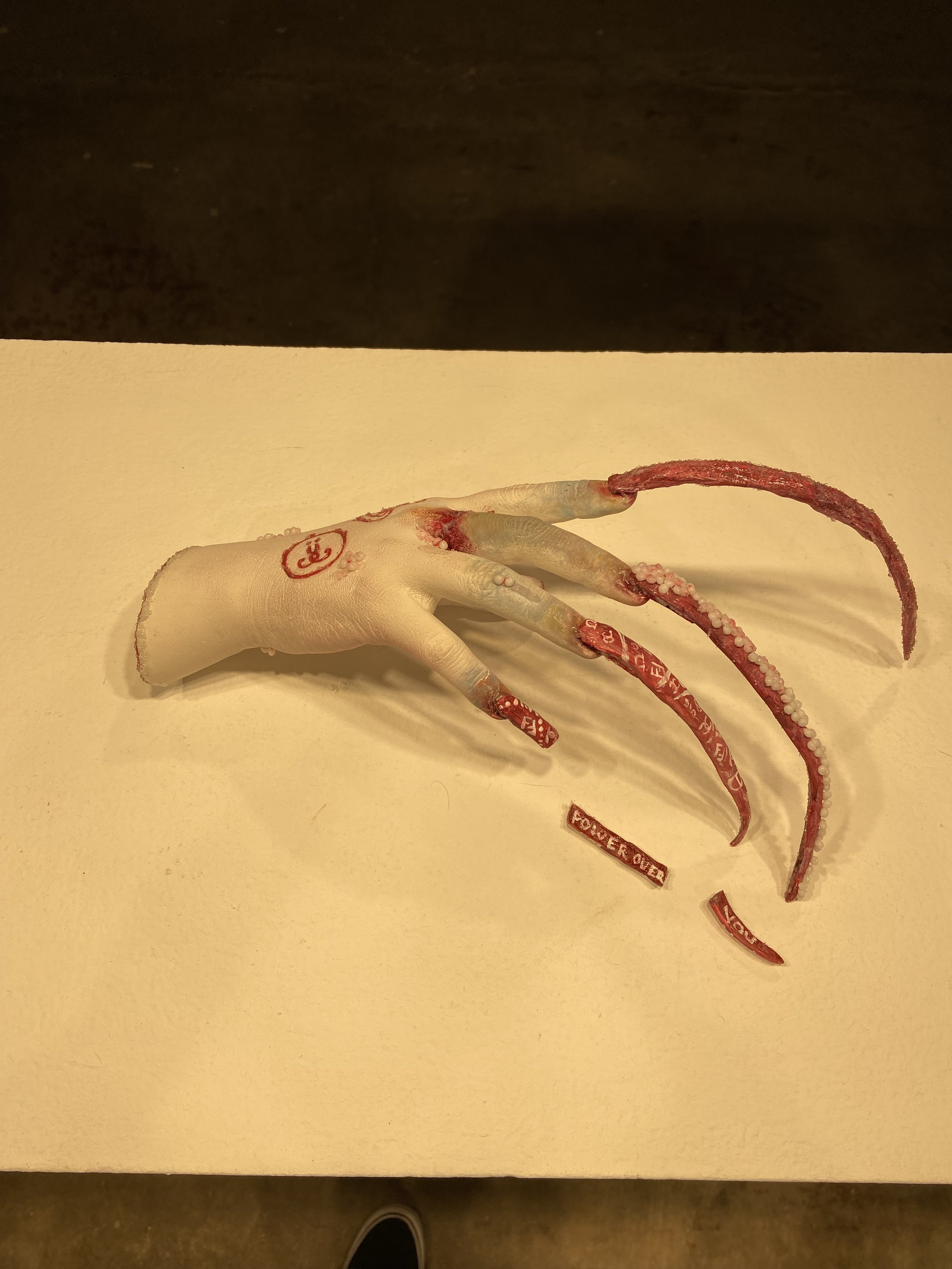 Hand cast, 2023, plaster, acrylic nails, glass bead gel, gouache