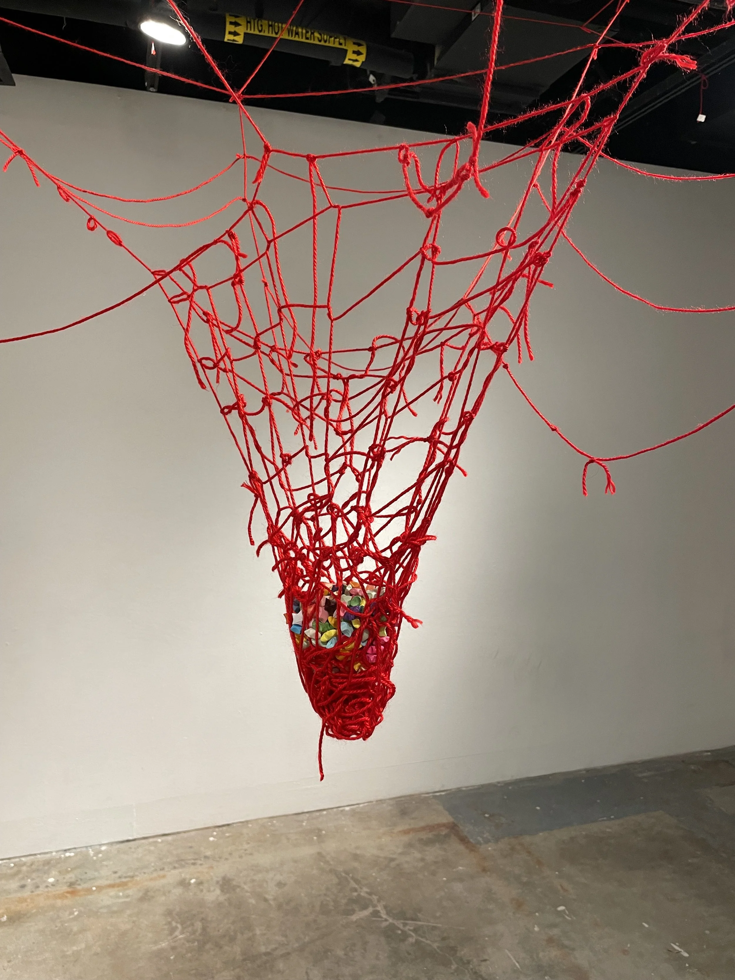 Wishing Well, 2023, yarn, origami stars