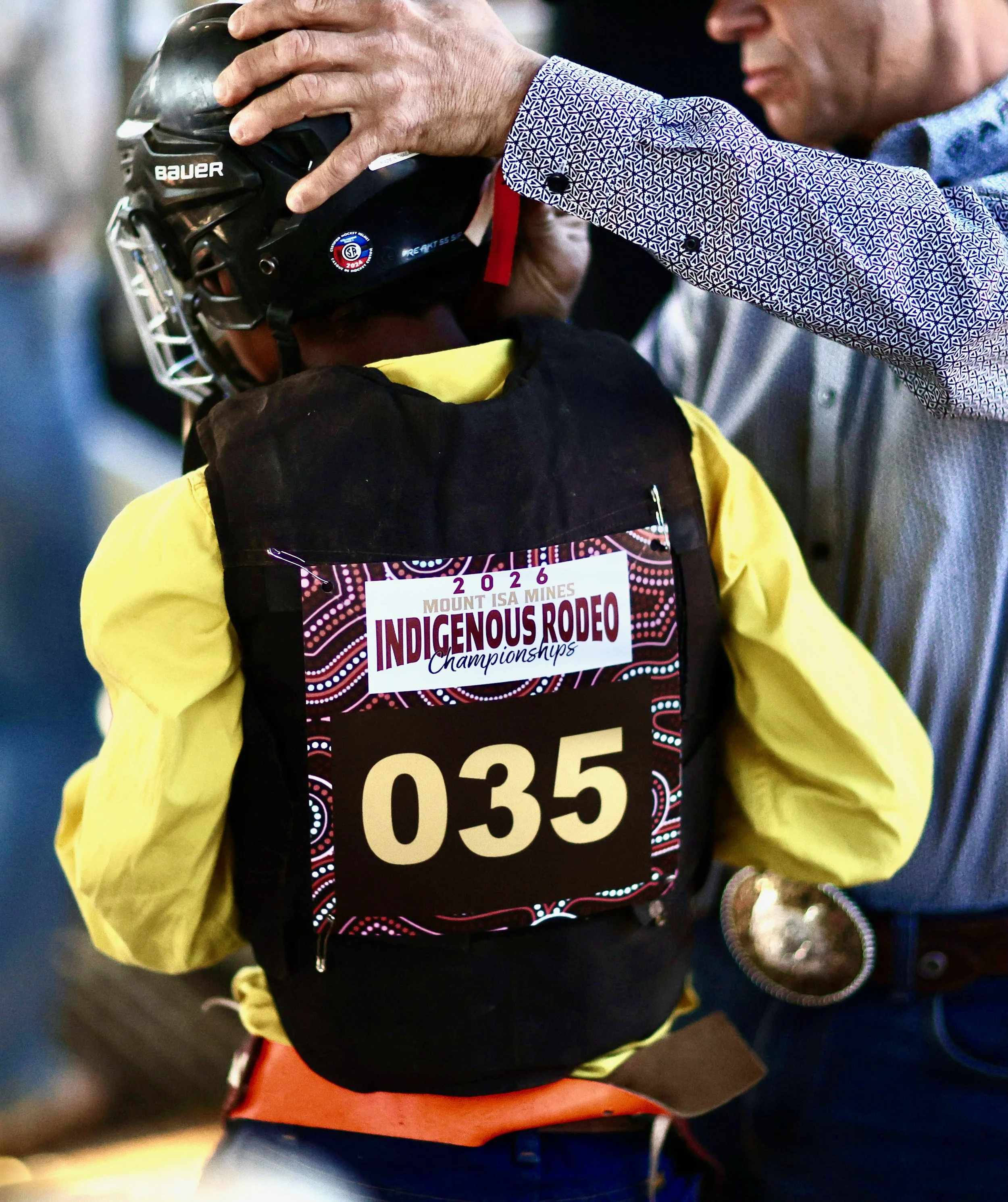 Young rider preparing for the 2026 Indigenous Rodeo Championships at the Mount Isa Mines Rodeo, Outback Queensland, Australia.