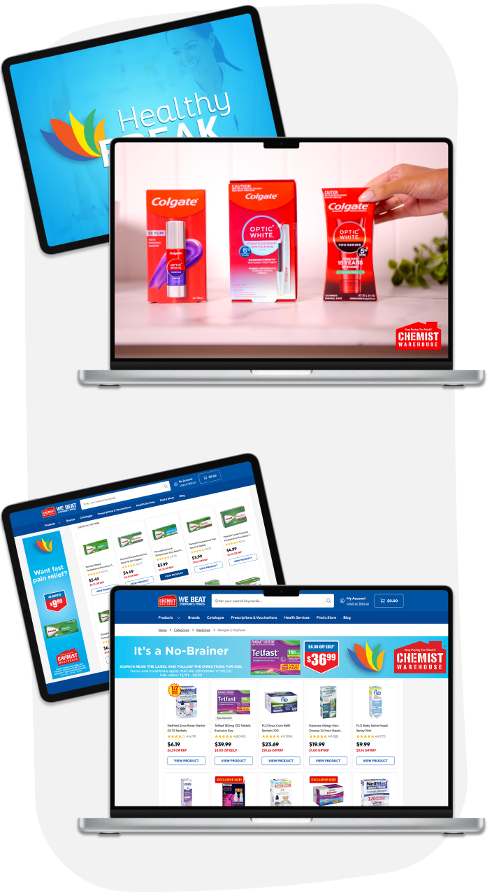 Two laptops displaying online store pages for health and pharmacy products at Chemist Warehouse, with the top laptop also showing Colgate toothpaste products.