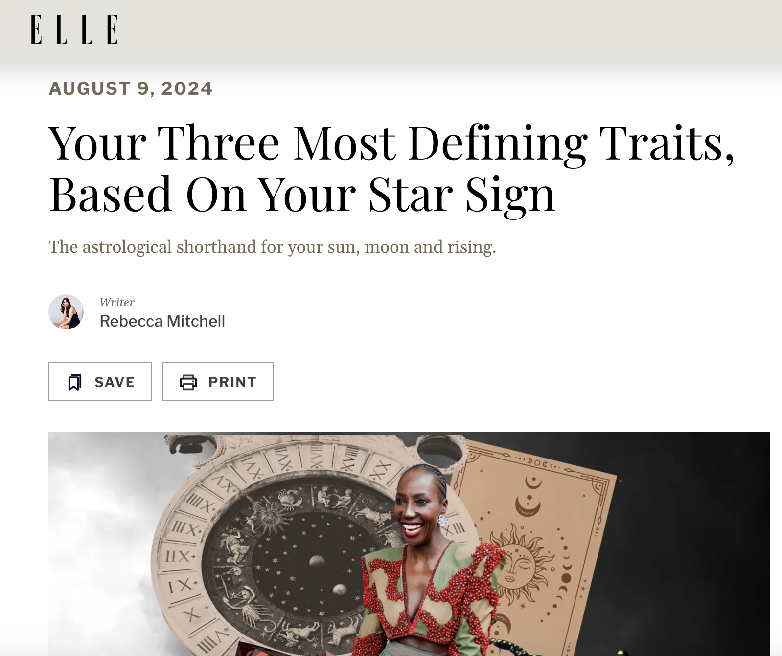 An astrology article by Rebecca Mitchell on ELLE showing the headline 'Your Three Most Defining Traits, Based On Your Star Sign' with a subheading about astrology, and a picture of a smiling woman with zodiac and celestial imagery in the background.