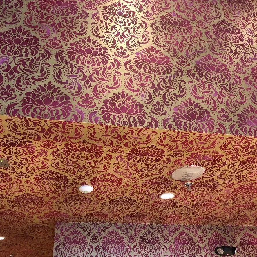 Hand stencilled wallpaper for Austin restaurant 