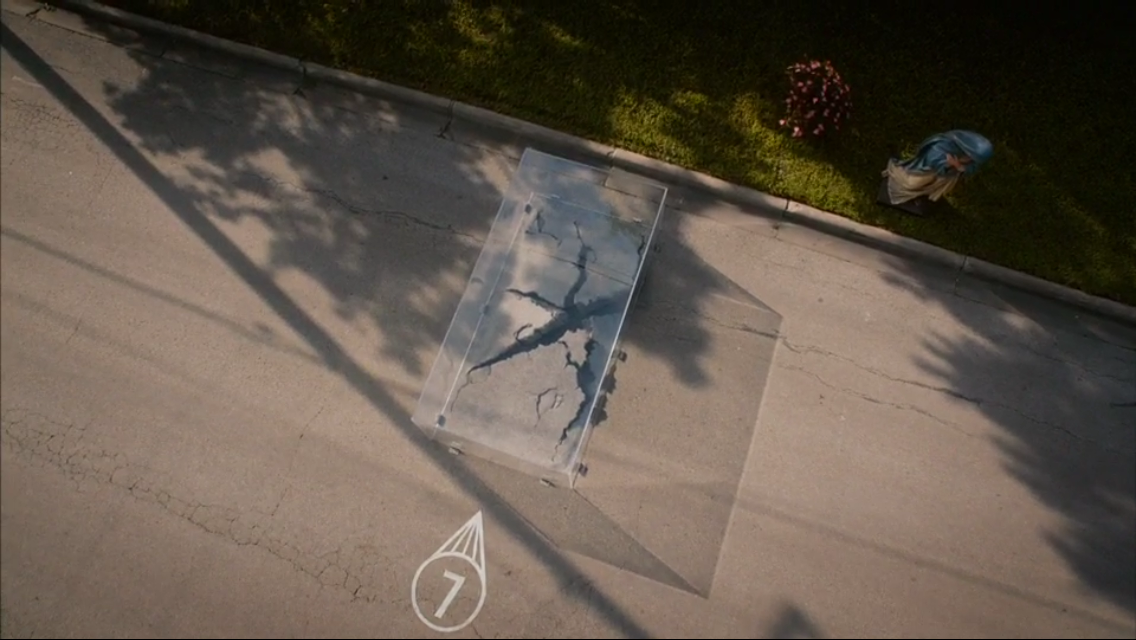 Screenshot of faux painted road crack in episode