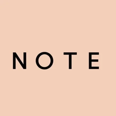 The word 'NOTE' written in black letters on a pink background.