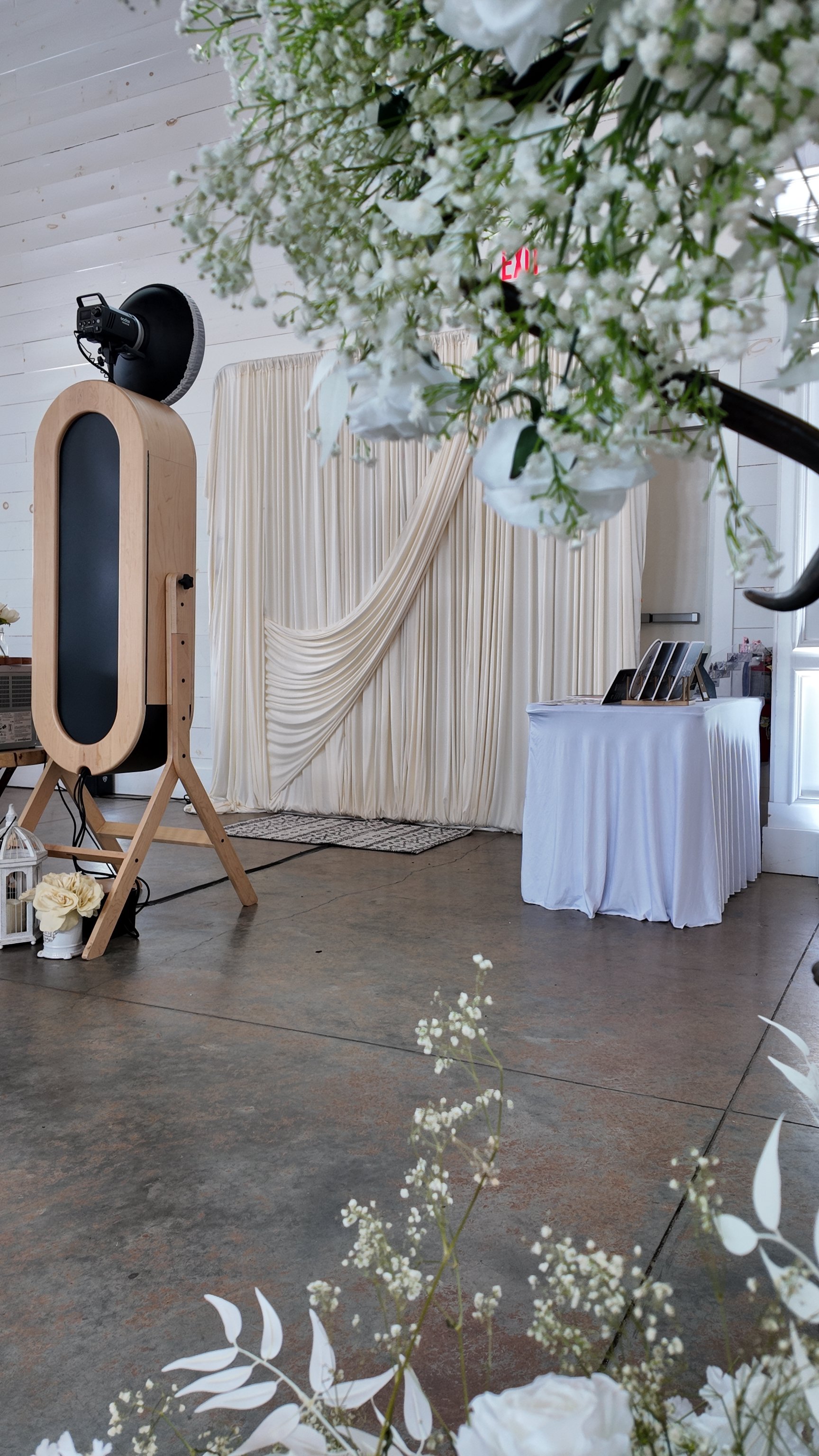 Luxury retro mirror photobooth with elegant ivory drape backdrop by Bella Photobooth, designed for timeless wedding celebrations in Atlanta, Georgia.