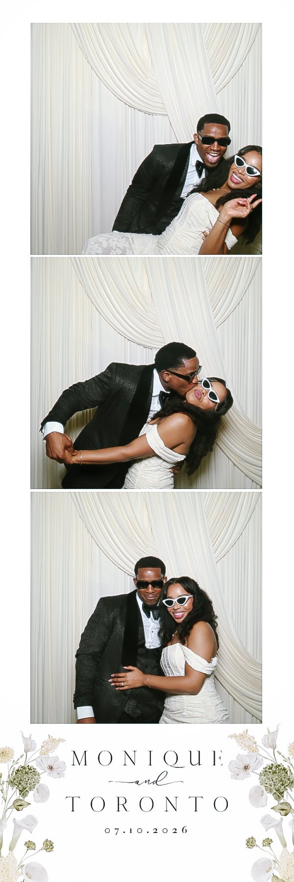 Bride and groom posing in sunglasses against an ivory drape backdrop with Bella’s Retro Mirror Photobooth in metro Atlanta.