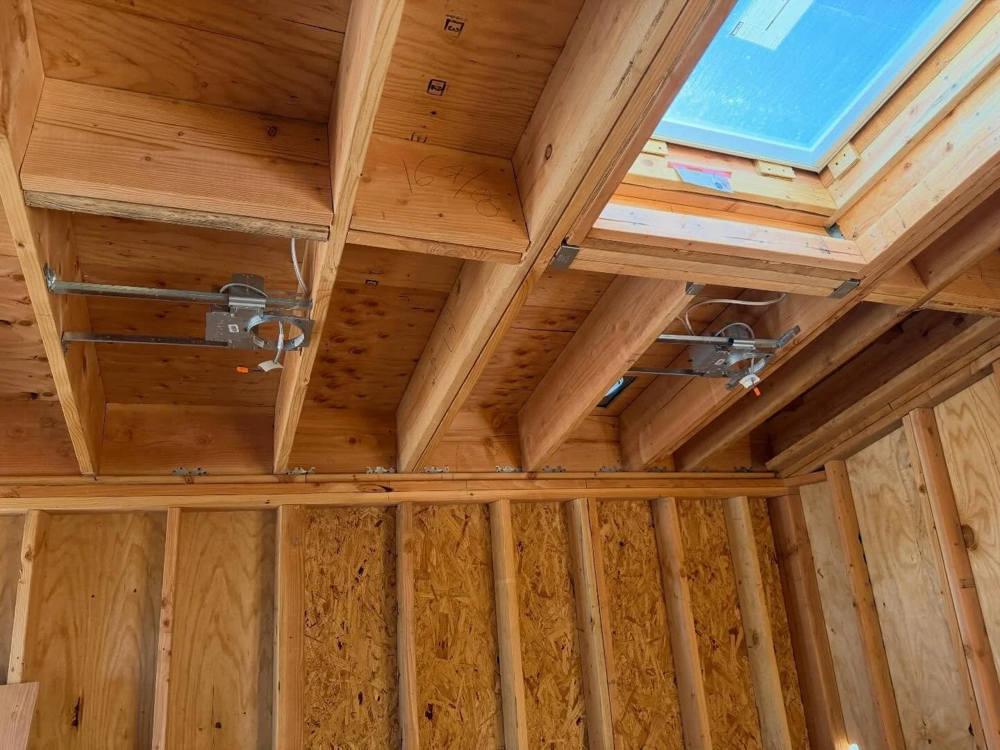 Recessed lighting + skylight = a very well lit room/area