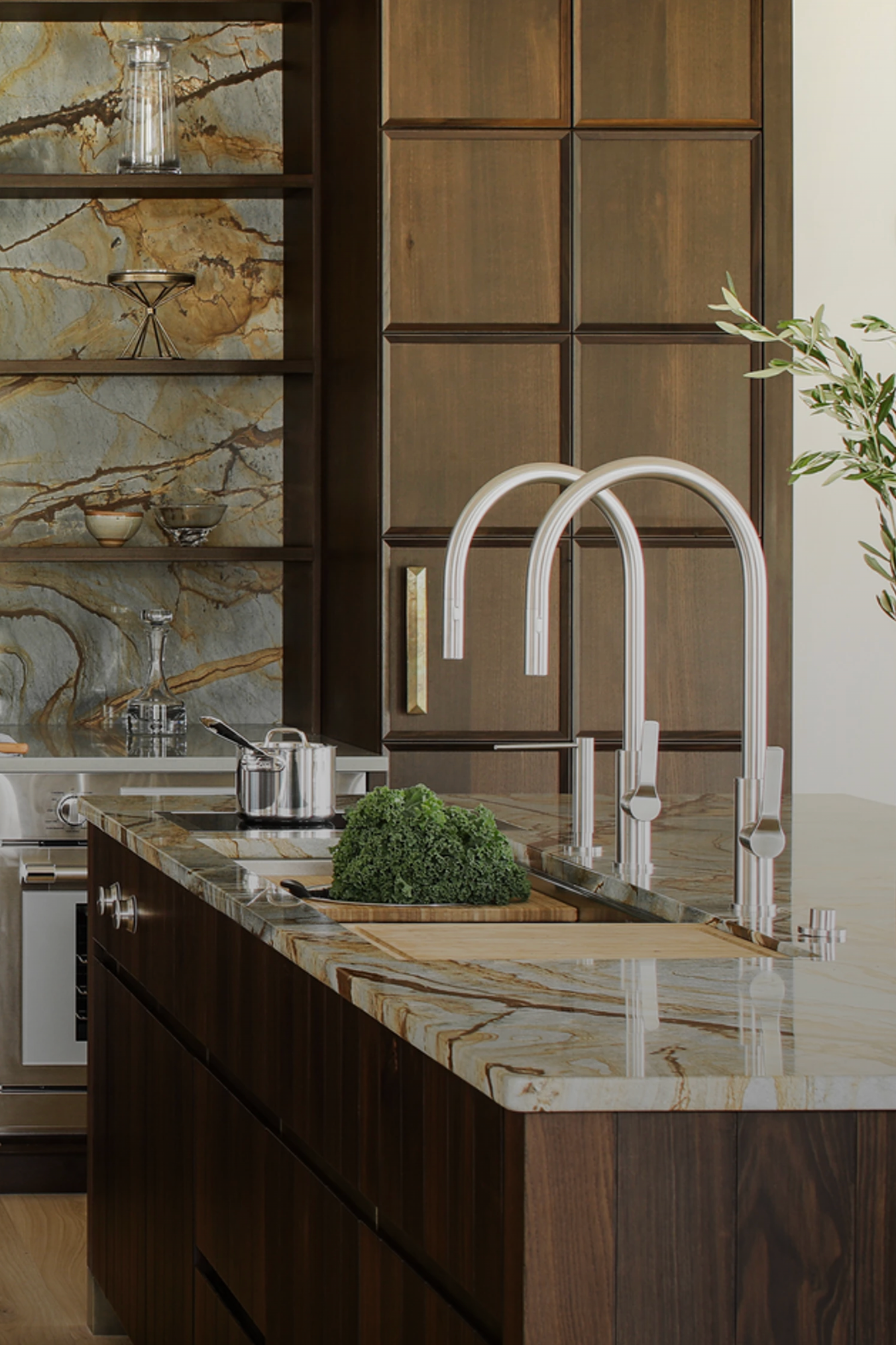 A kitchen with the galley sink system in silver