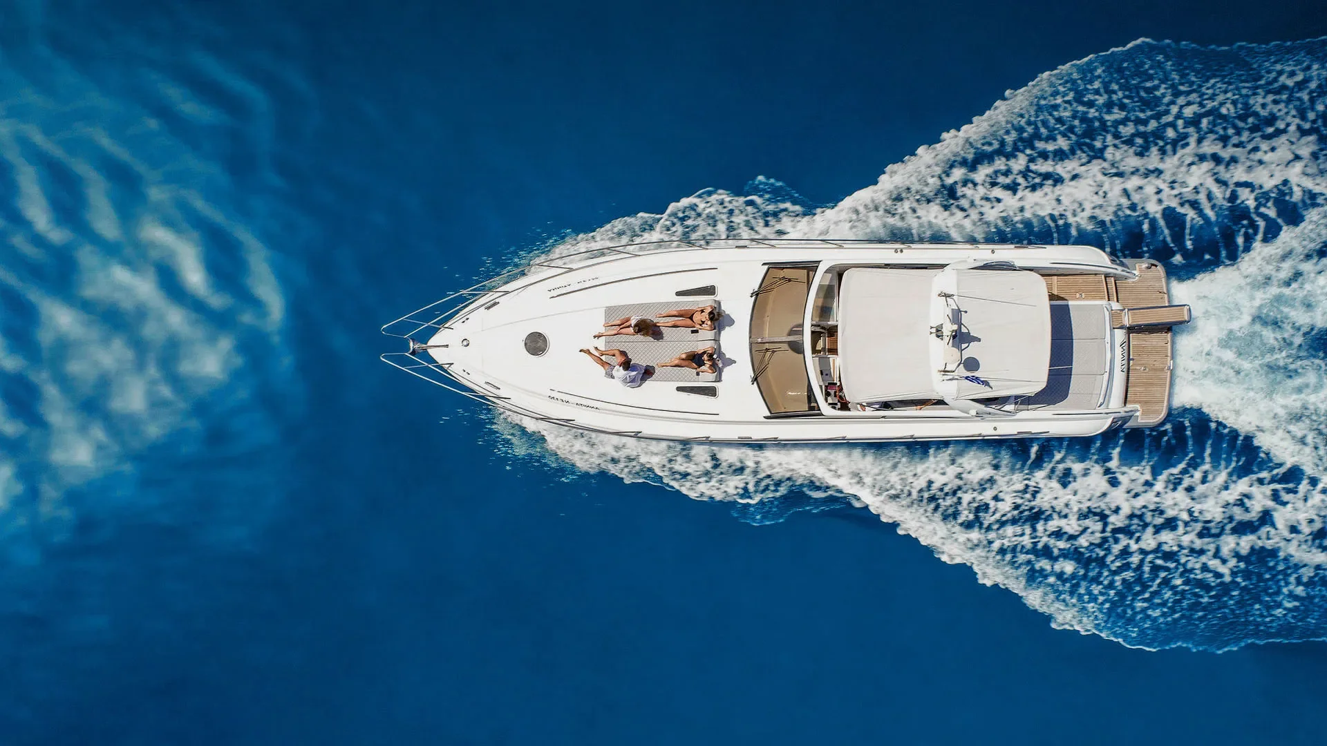 A motor yacht under way, seen from the air