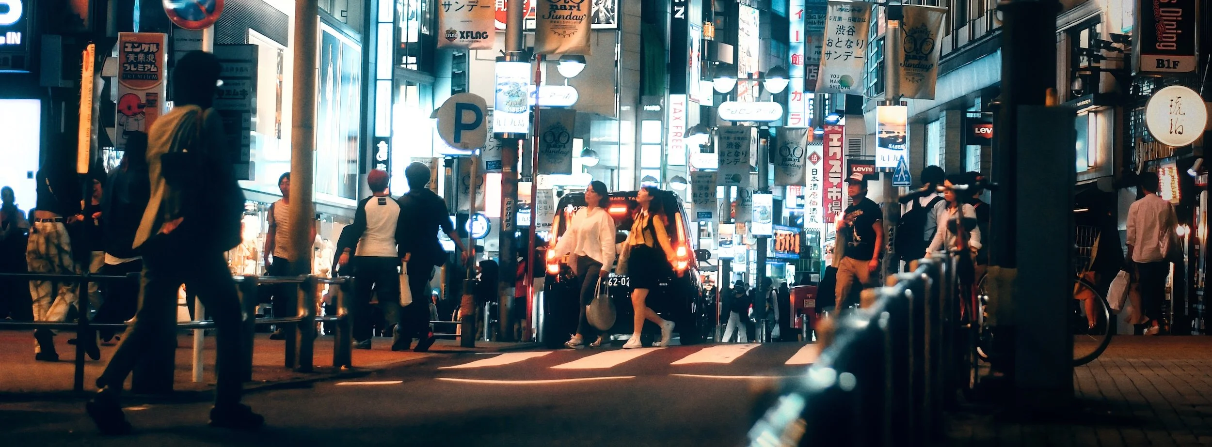 Street photograph, Tokyo 2019. 65x24 wide panoramic format.