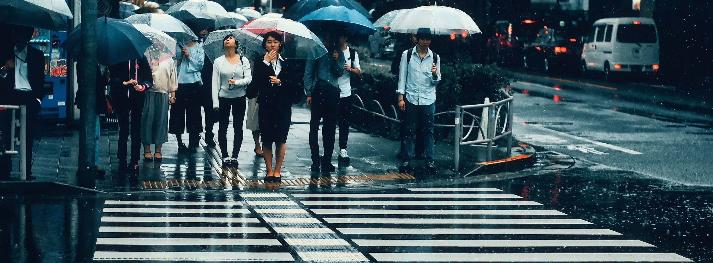 Wide format street photograph by Iván Pasarín,  Tokyo 2019, 65×24 panoramic format.