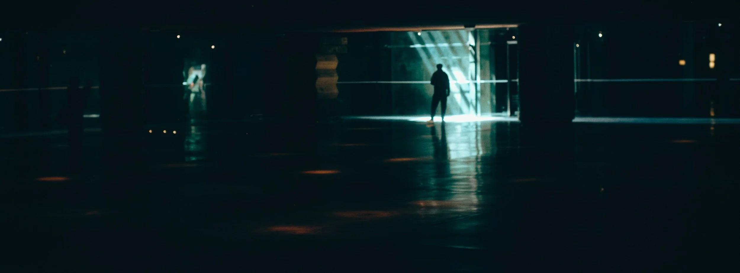 Street photograph, Bilbao, 2025. 65×24 wide panoramic format.
