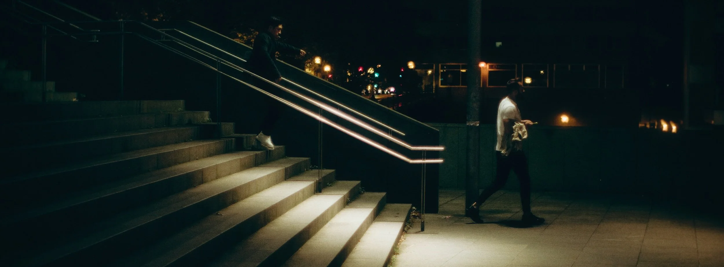 Street photograph, Bilbao, 2025. 65×24 wide panoramic format.
