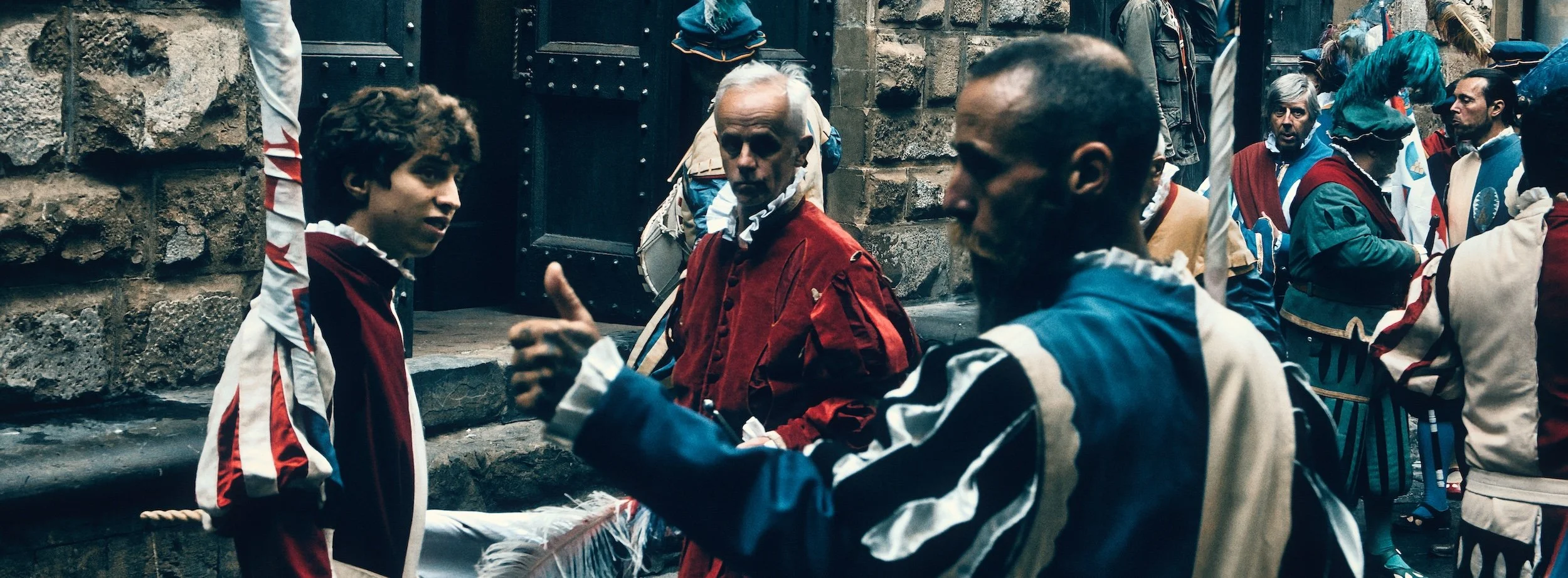 Street photograph, Florence 2024. 65x24 wide panoramic format.