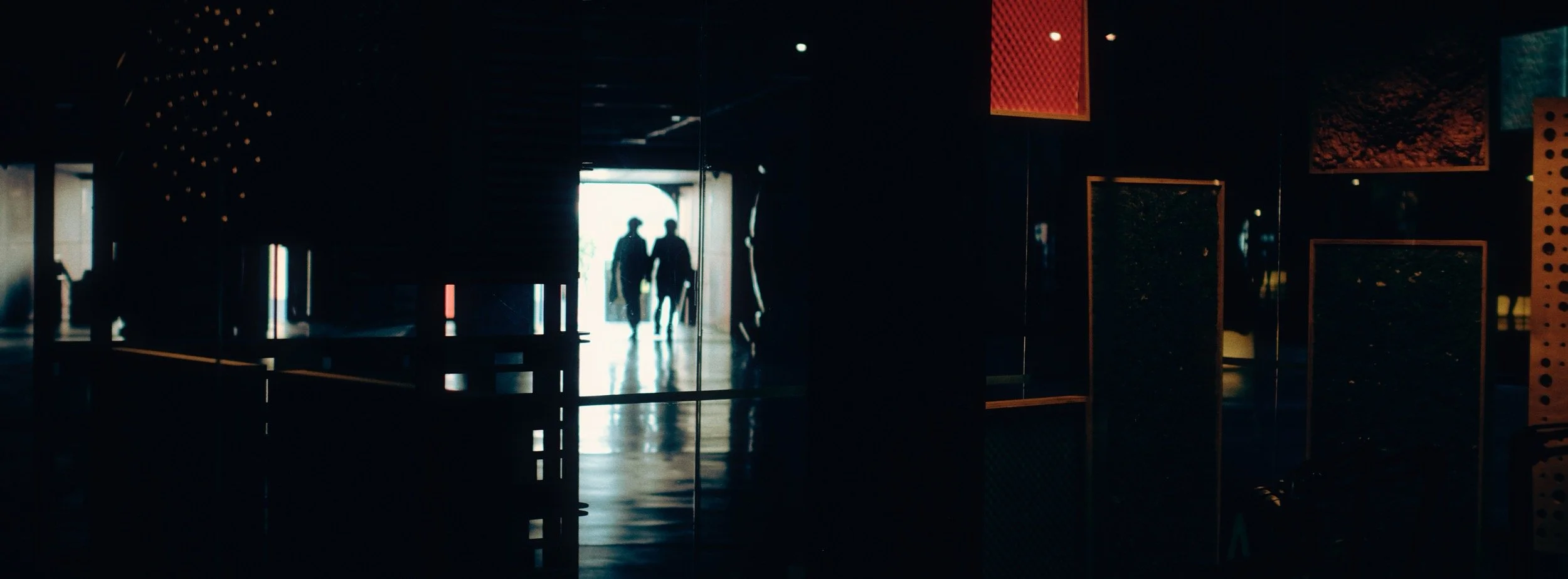 Street photograph, Bilbao, 2025. 65×24 wide panoramic format.
