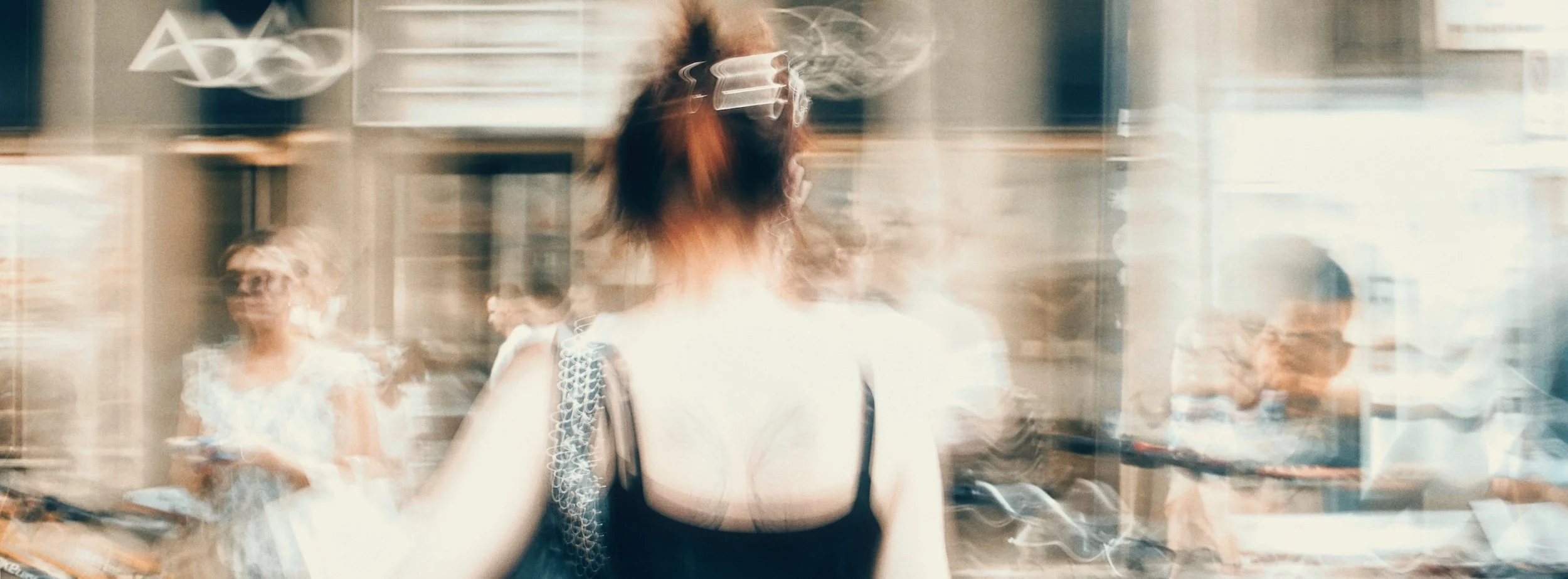 Street photograph, Florence 2024. 65x24 wide panoramic format.