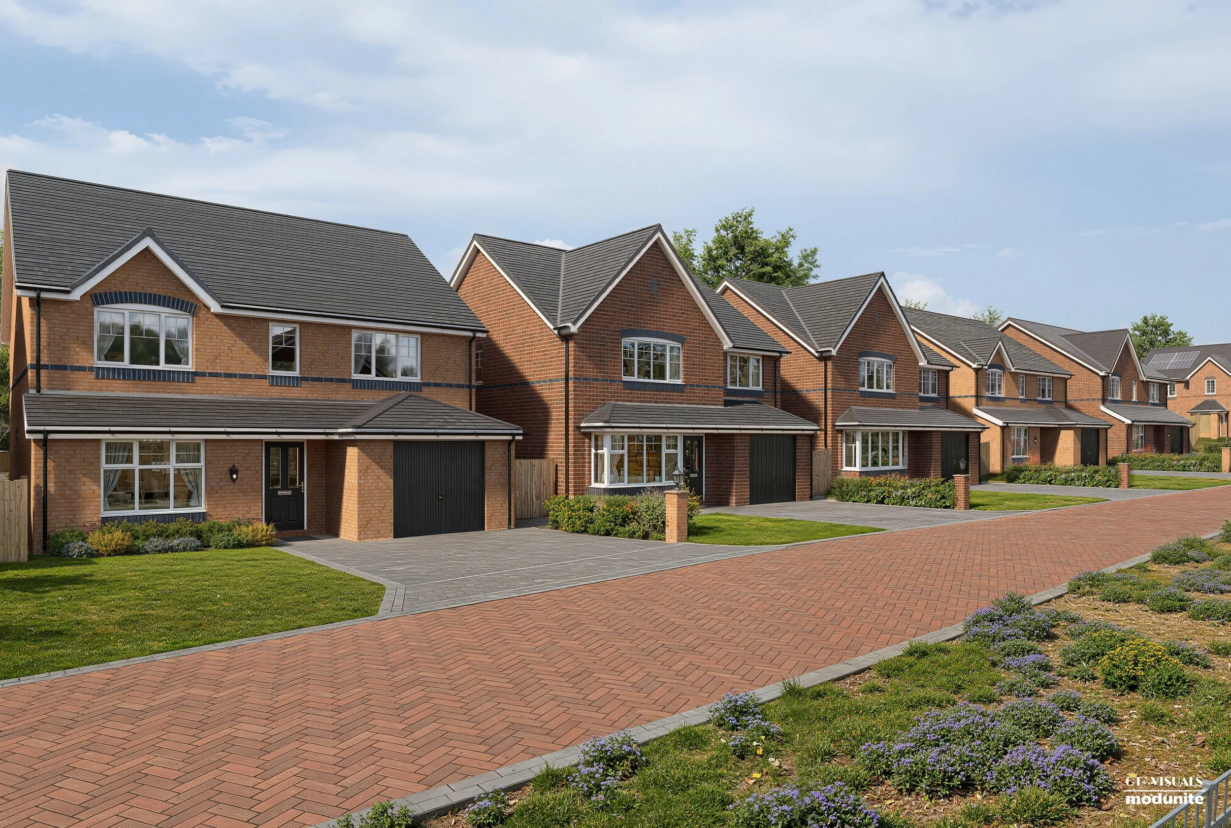 Row of modern brick townhouses with large windows, sloped roofs, and small front yards with landscaped gardens and paved walkways.