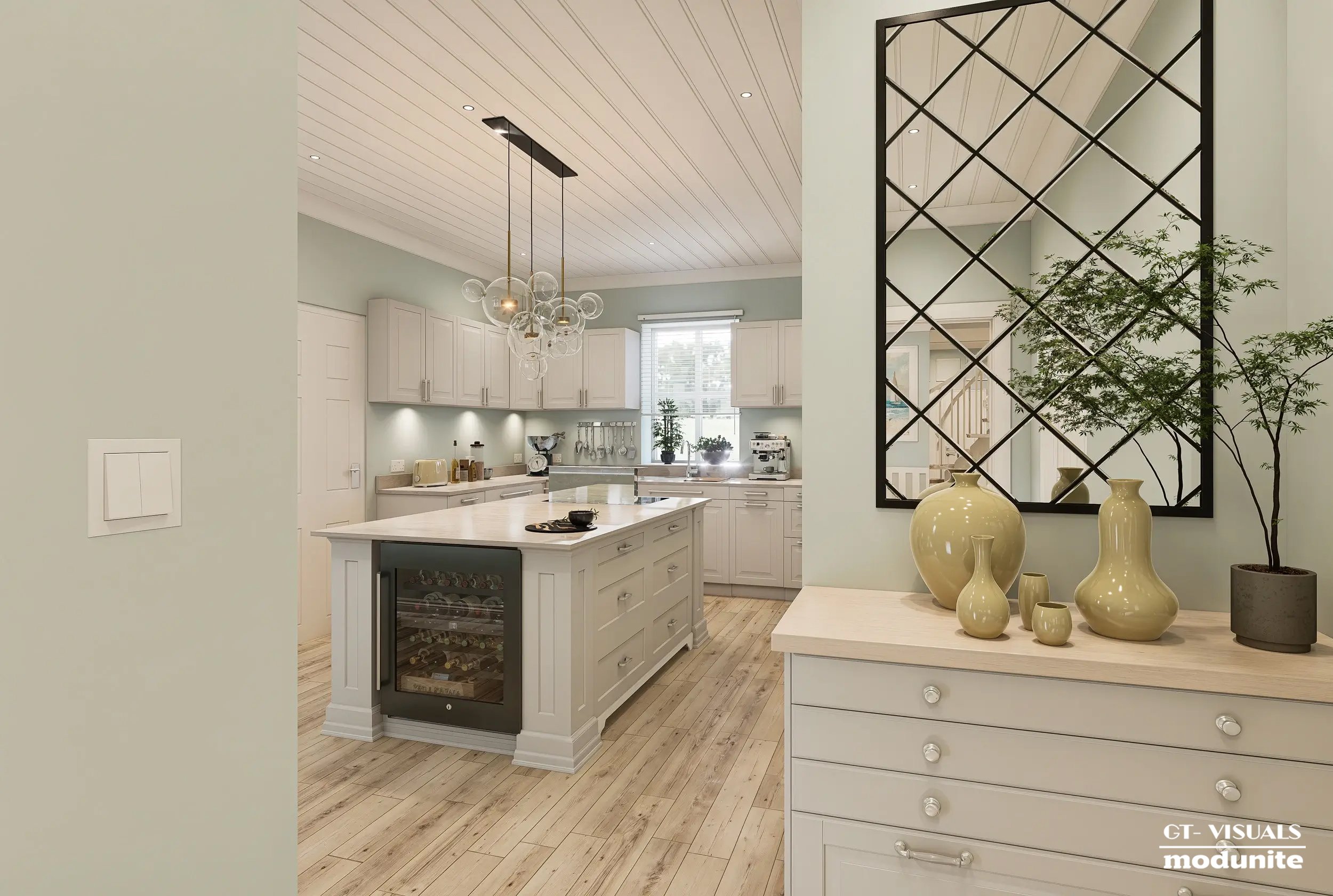 Modern kitchen with white cabinets, a central island, and a decorative black geometric mirror on the wall, with beige vases and a potted plant in the foreground.