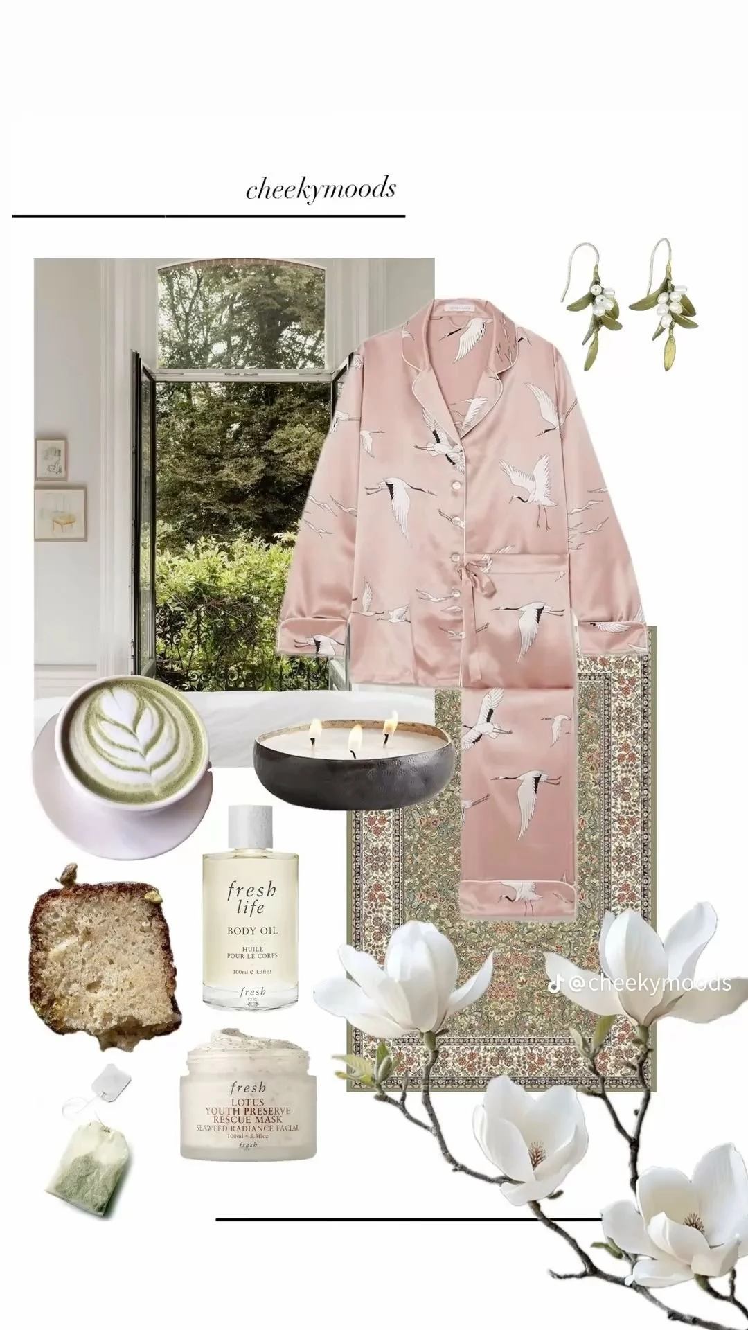 Lifestyle moodboard by CheekyMoods showcasing a set of pink satin pajamas with a white crane pattern, mistletoe earrings, Fresh Life body oil, matching lotus face cream, matcha latte, and magnolia flowers.