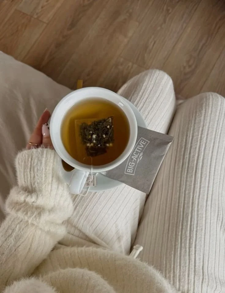 drinking tea at home in loungewear