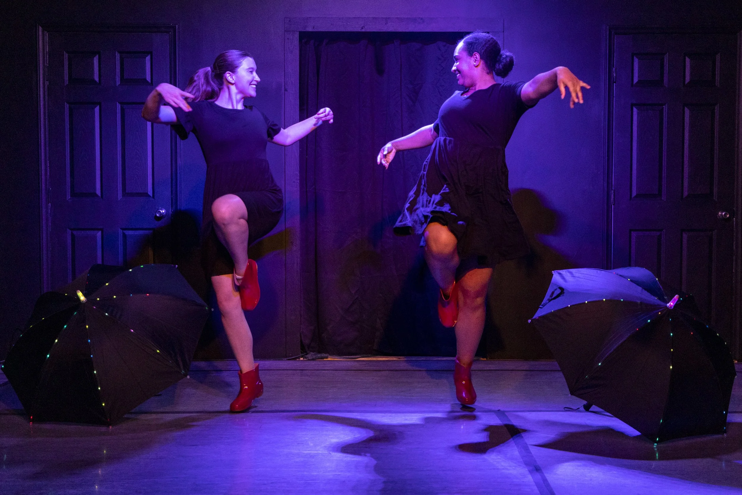 Two dancers perform in a work by Audrey Fenske