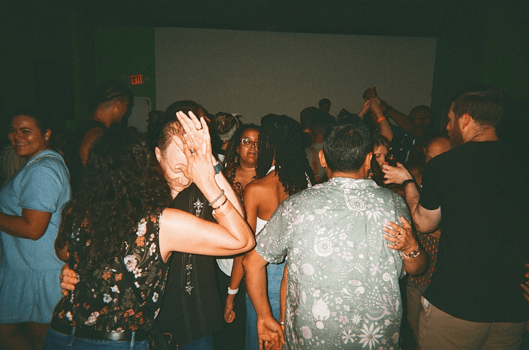 A group of people dancing and socializing at Lolo's Social Club.